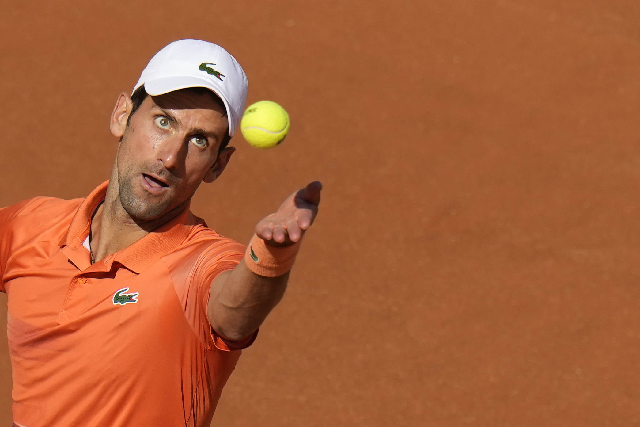 Serbia's Novak Djokovic serves the ball to Greece's Stefanos Tsitsipas during their final match at the Italian Open tennis tournament, in Rome, Sunday, May 15, 2022. (AP Photo/Alessandra Tarantino)
