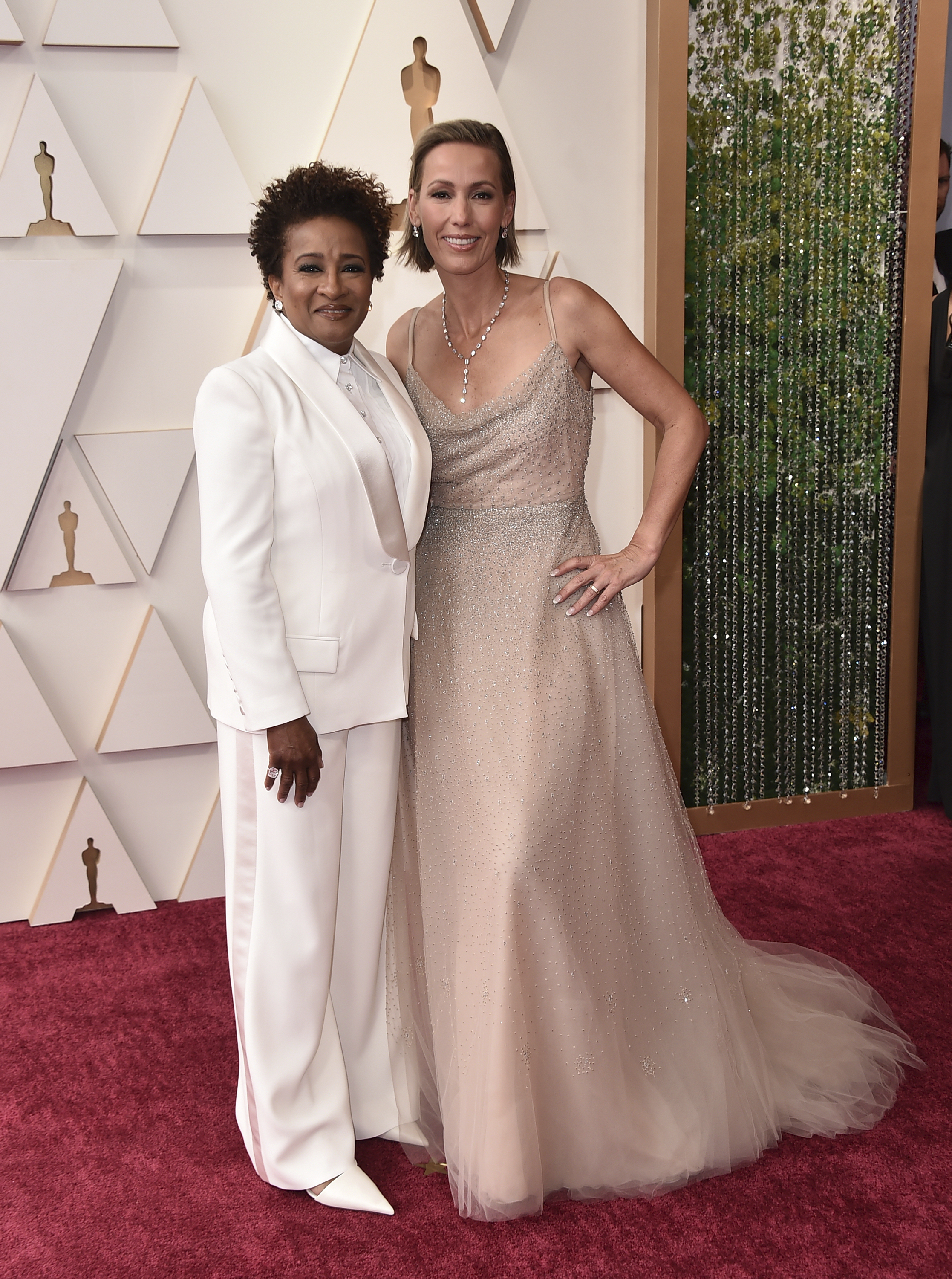 Wanda Sykes, left, and Alex Sykes arrive at the Oscars on Sunday, March 27, 2022, at the Dolby Theatre in Los Angeles. (Photo by Jordan Strauss/Invision/AP)