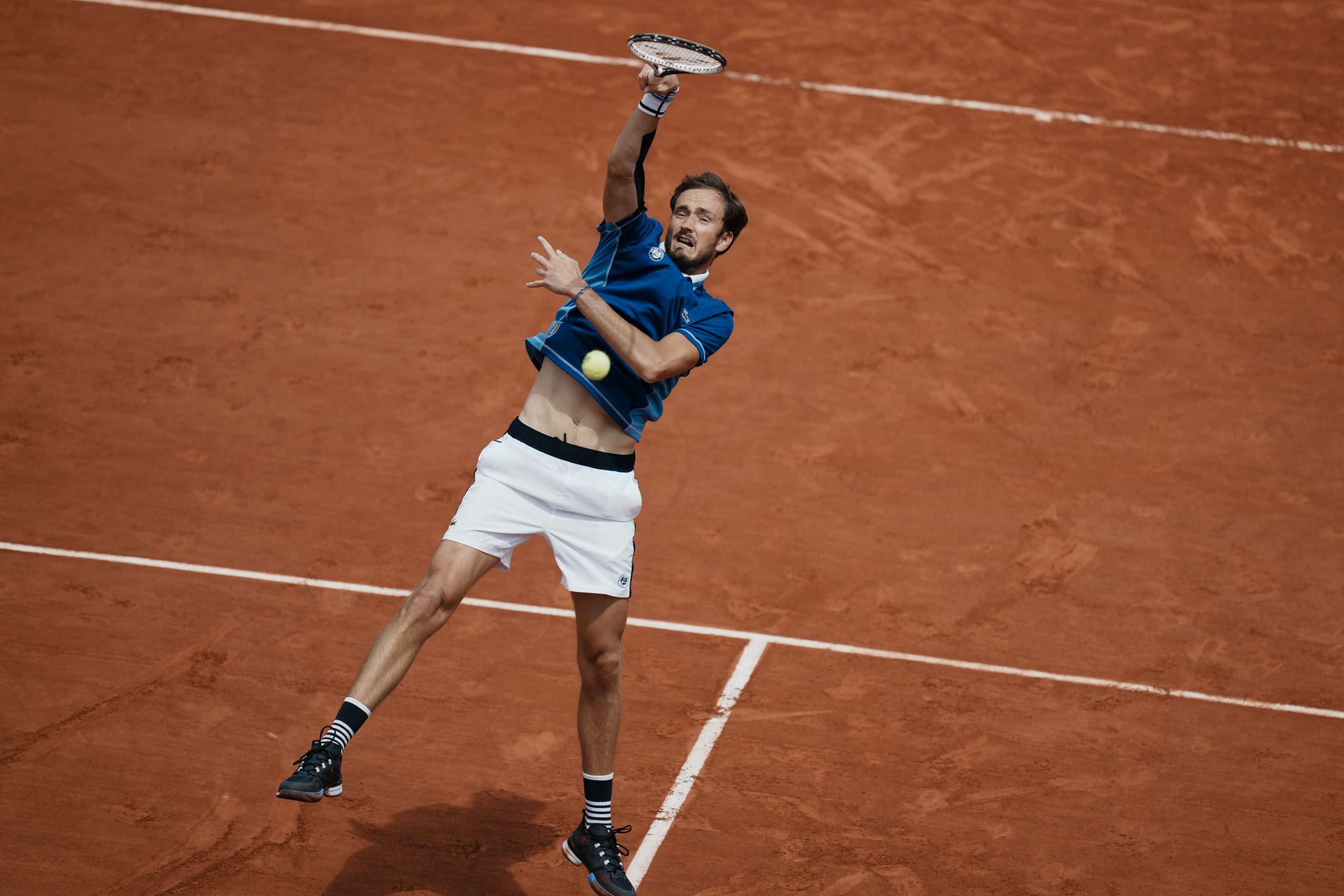 Russia's Daniil Medvedev plays a shot against Serbia's Miomir Kecmanovic during their third round match at the French Open tennis tournament in Roland Garros stadium in Paris, France, Saturday, May 28, 2022. (AP Photo/Thibault Camus)