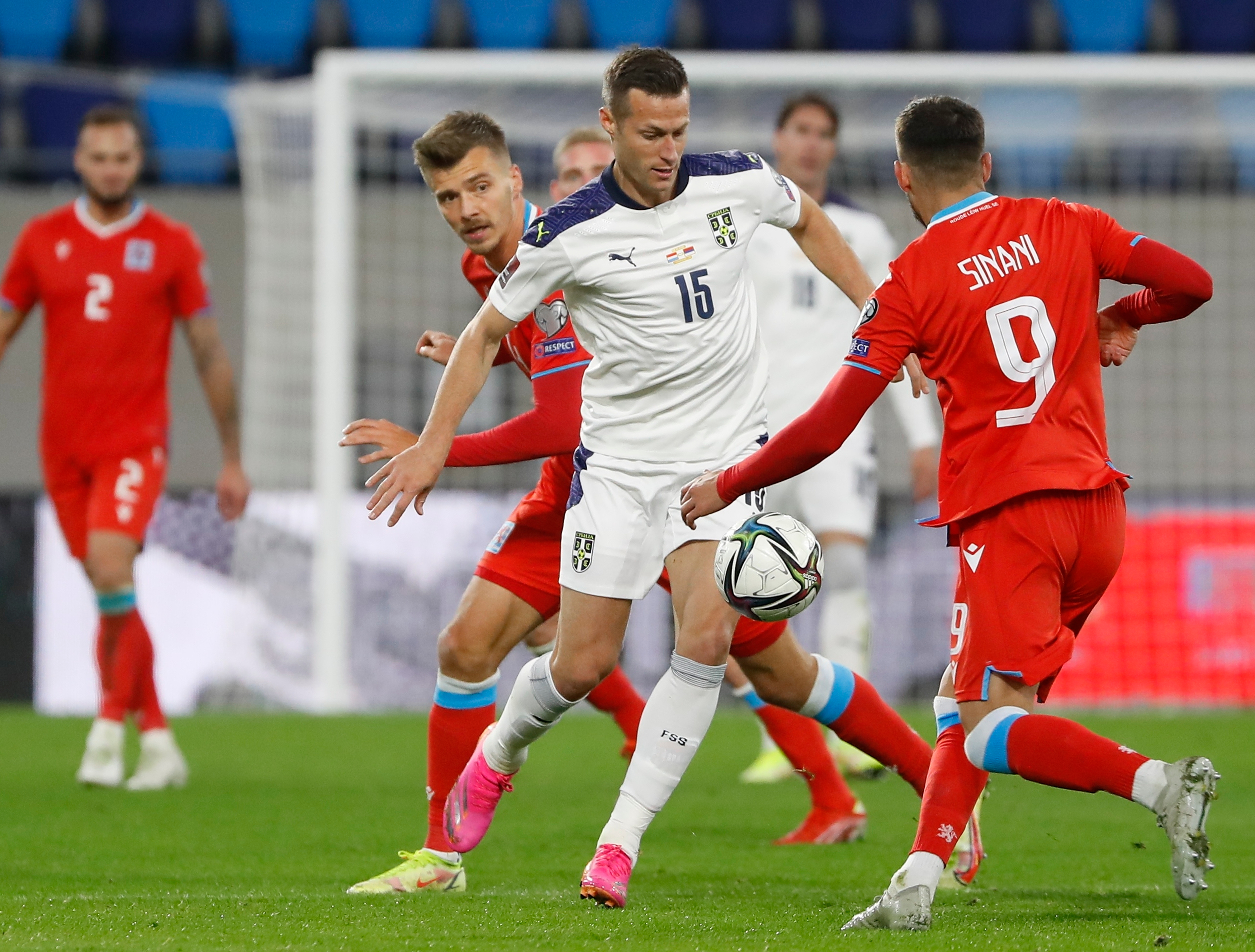 epa09515660 Serbia's Uros Spajic (L) in action against Luxembourg's Danel Sinani (R) during the FIFA World Cup 2022 qualifying soccer match between Luxembourg and Serbia in Luxembourg, 09 October 2021.  EPA-EFE/JULIEN WARNAND