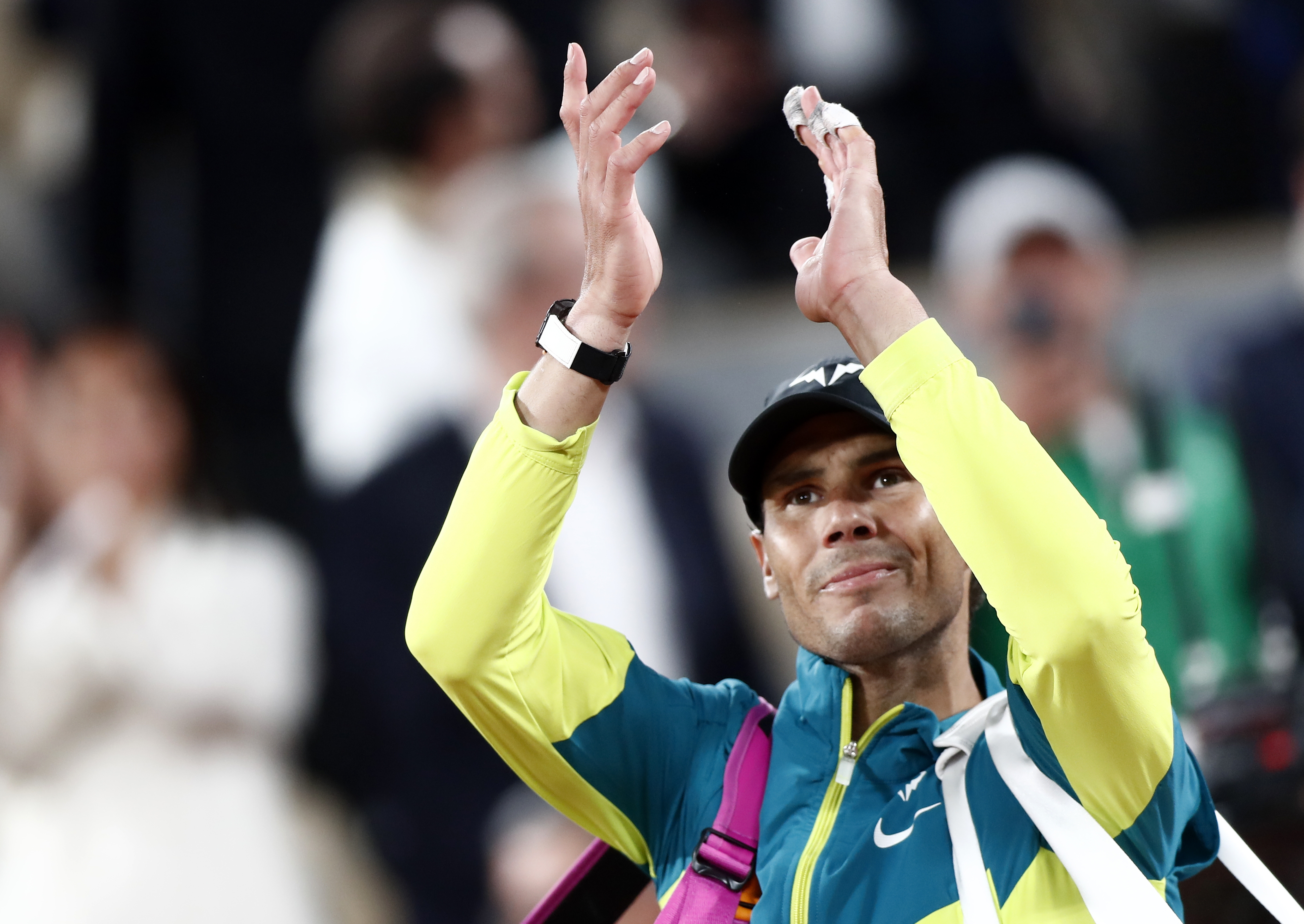epa09988855 Rafael Nadal of Spain celebrates winning against Novak Djokovic of Serbia in their men?s quarterfinal match during the French Open tennis tournament at Roland ?Garros in Paris, France, 01 June 2022.  EPA-EFE/MOHAMMED BADRA