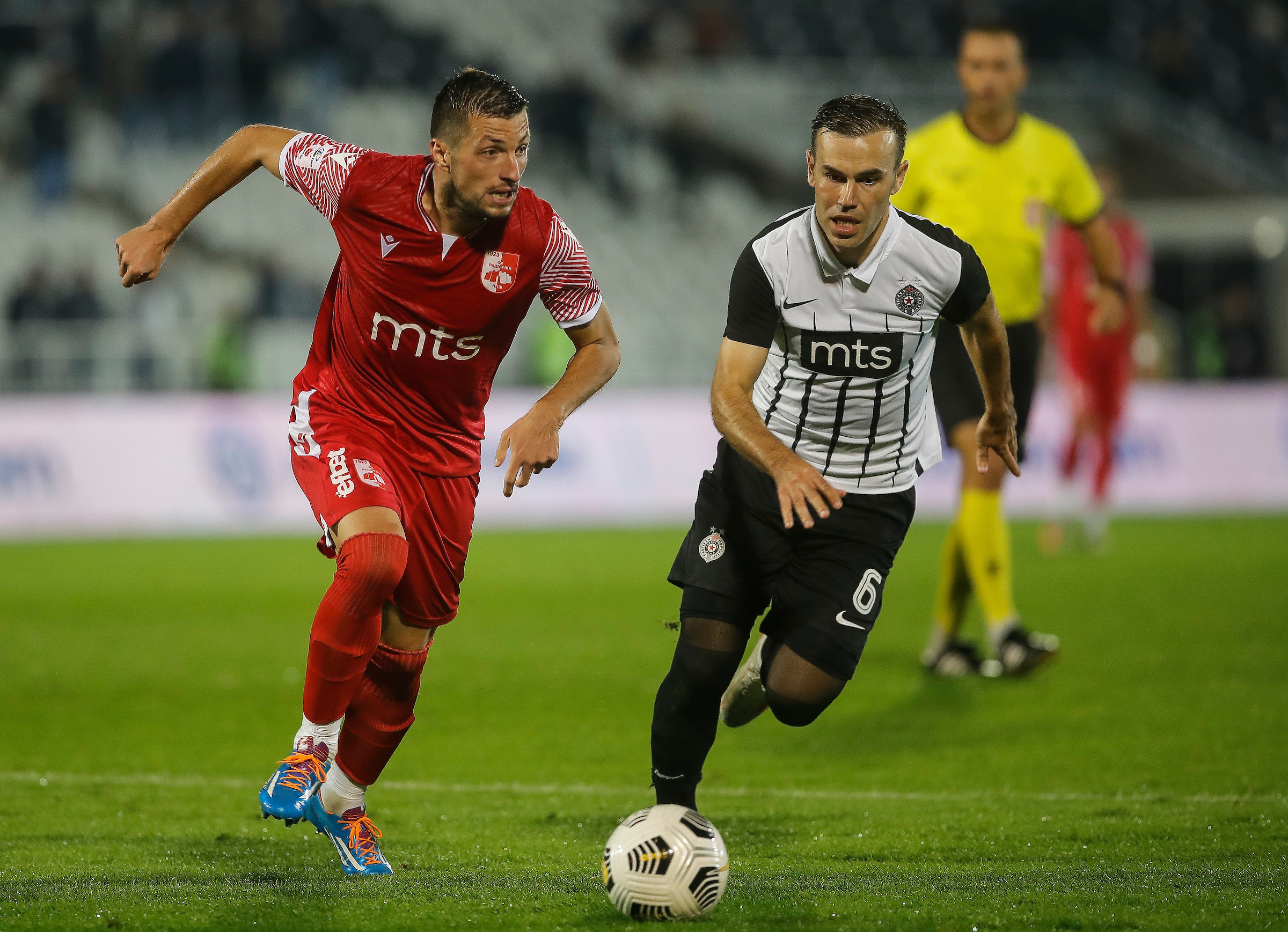 Aleksandar Pejovic (L) and Bibras Natkho Natcho
Fudbal-Super League Season 2021/2022
FK Partizan v Radnicki Nis
Beograd, 29.08.2021.
foto: Starsport.rs ©