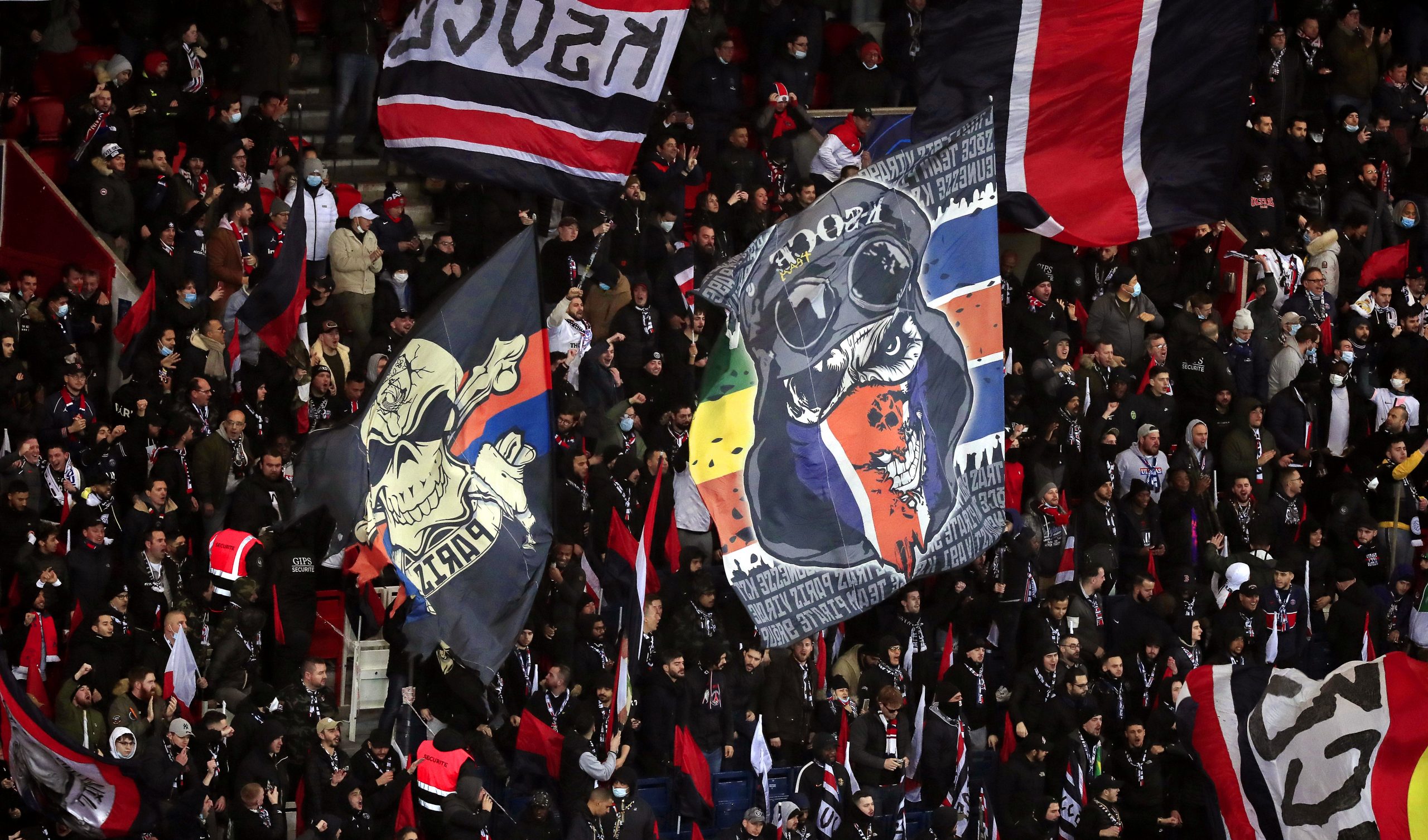 epa09760088 Fans of PSG cheer prior to the UEFA Champions League round of 16, first leg soccer match between Paris Saint-Germain (PSG) and Real Madrid in Paris, France, 15 February 2022.  EPA-EFE/Christophe Petit Tesson