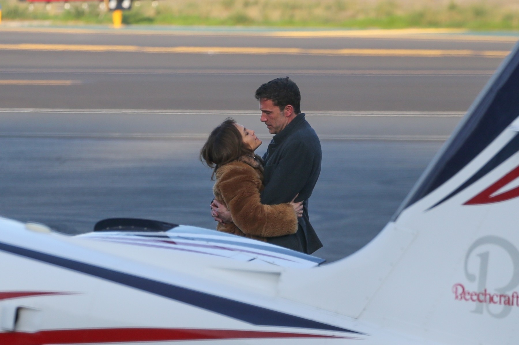 *EXCLUSIVE* Ben Affleck and Jennifer Lopez pack on the PDA as her pilot waits ahead of a flight out of LA