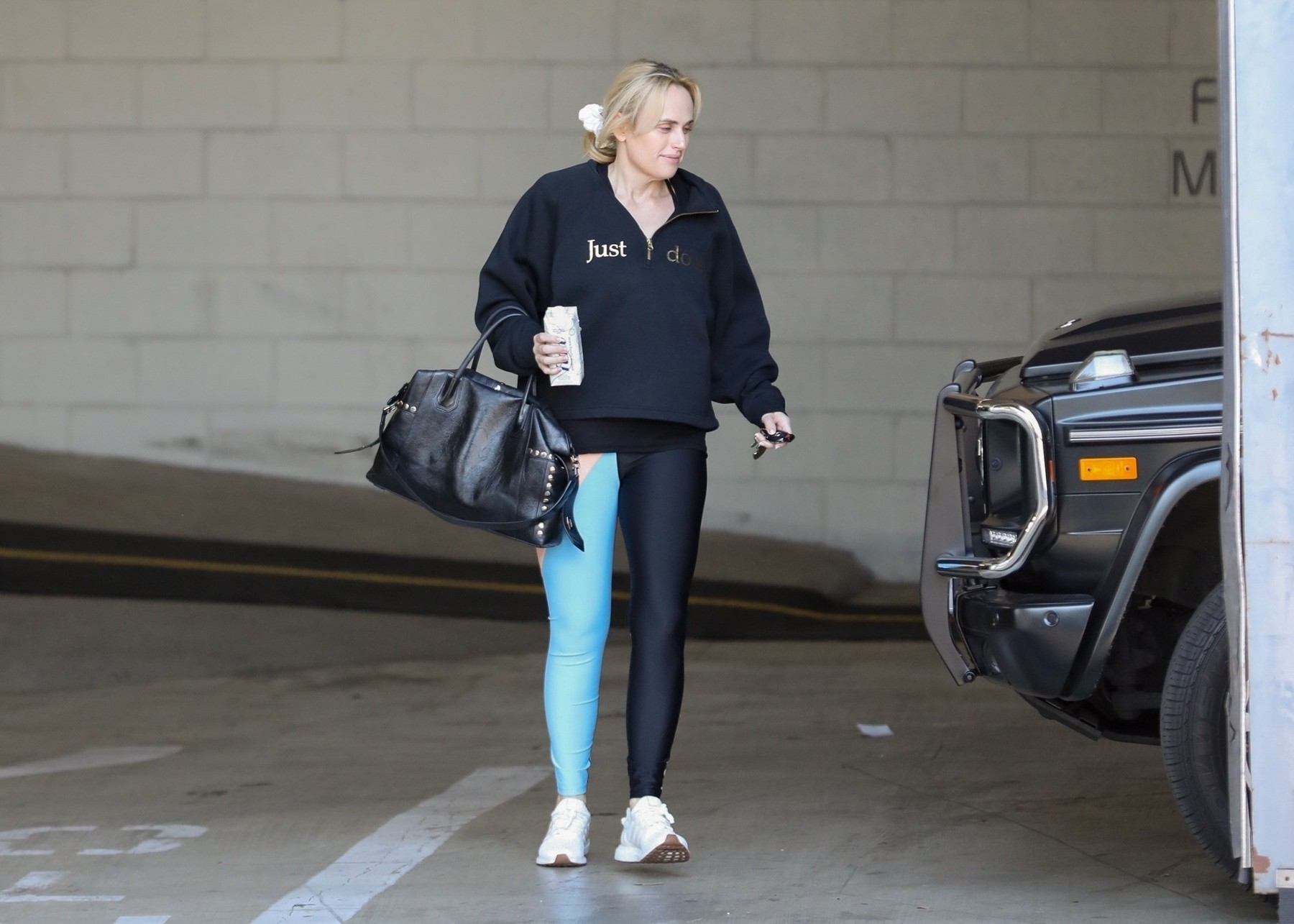*EXCLUSIVE* Rebel Wilson wears a Just Do It sweatshirt for a Presidents' Day workout session