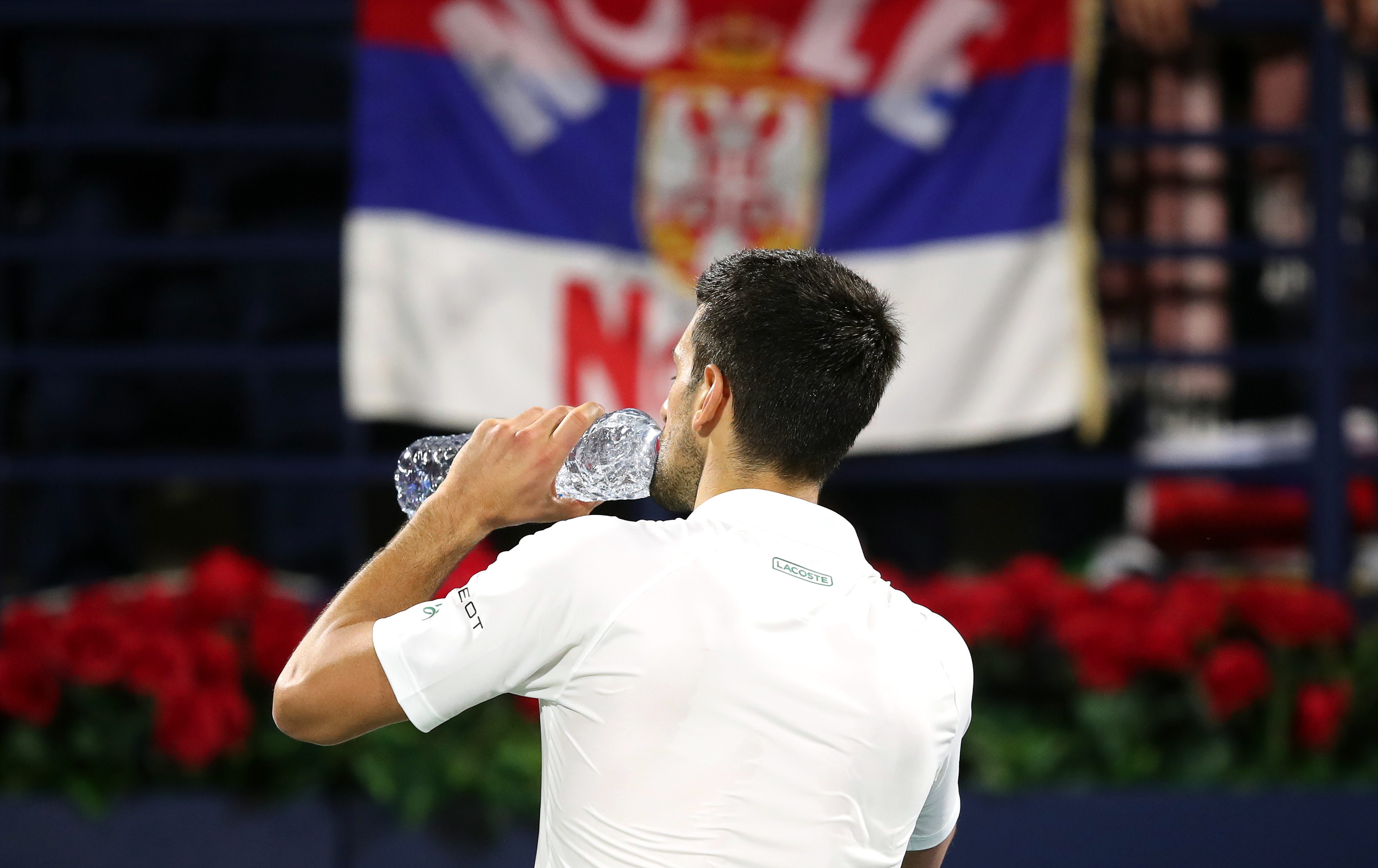 epa09781418 Novak Djokovic of Serbia reacts after losing his quarter final match against Jiri Vesely of the Czech Republic at the Dubai Duty Free Tennis ATP Championships 2022 in Dubai, United Arab Emirates, 24 February 2022.  EPA-EFE/ALI HAIDER