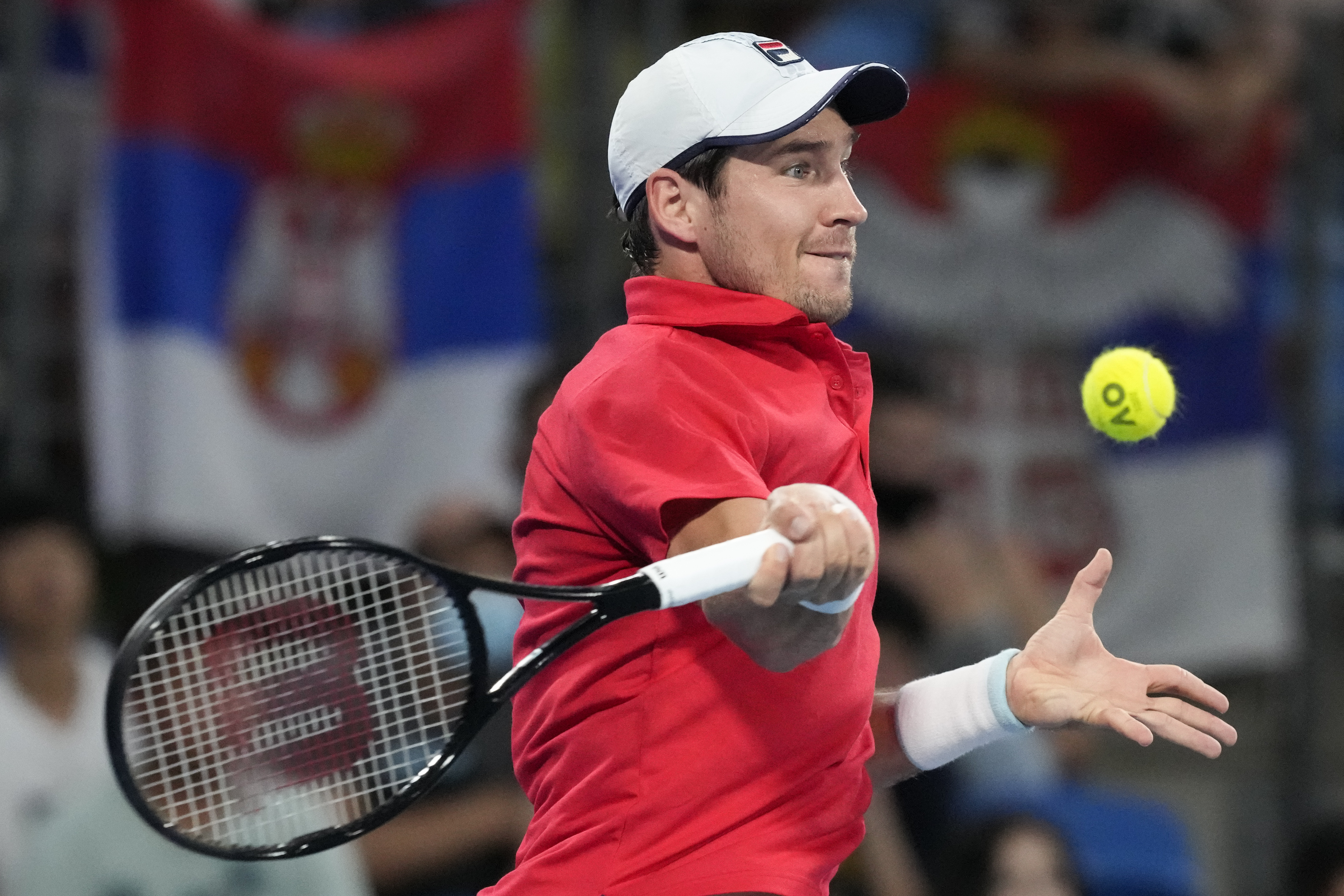 Serbia's Dusan Lajovic plays a forehand return to Spain's Roberto Bautista Agut during their match at the ATP Cup tennis tournament in Sydney, Australia, Wednesday, Jan. 5, 2022. (AP Photo/Mark Baker)