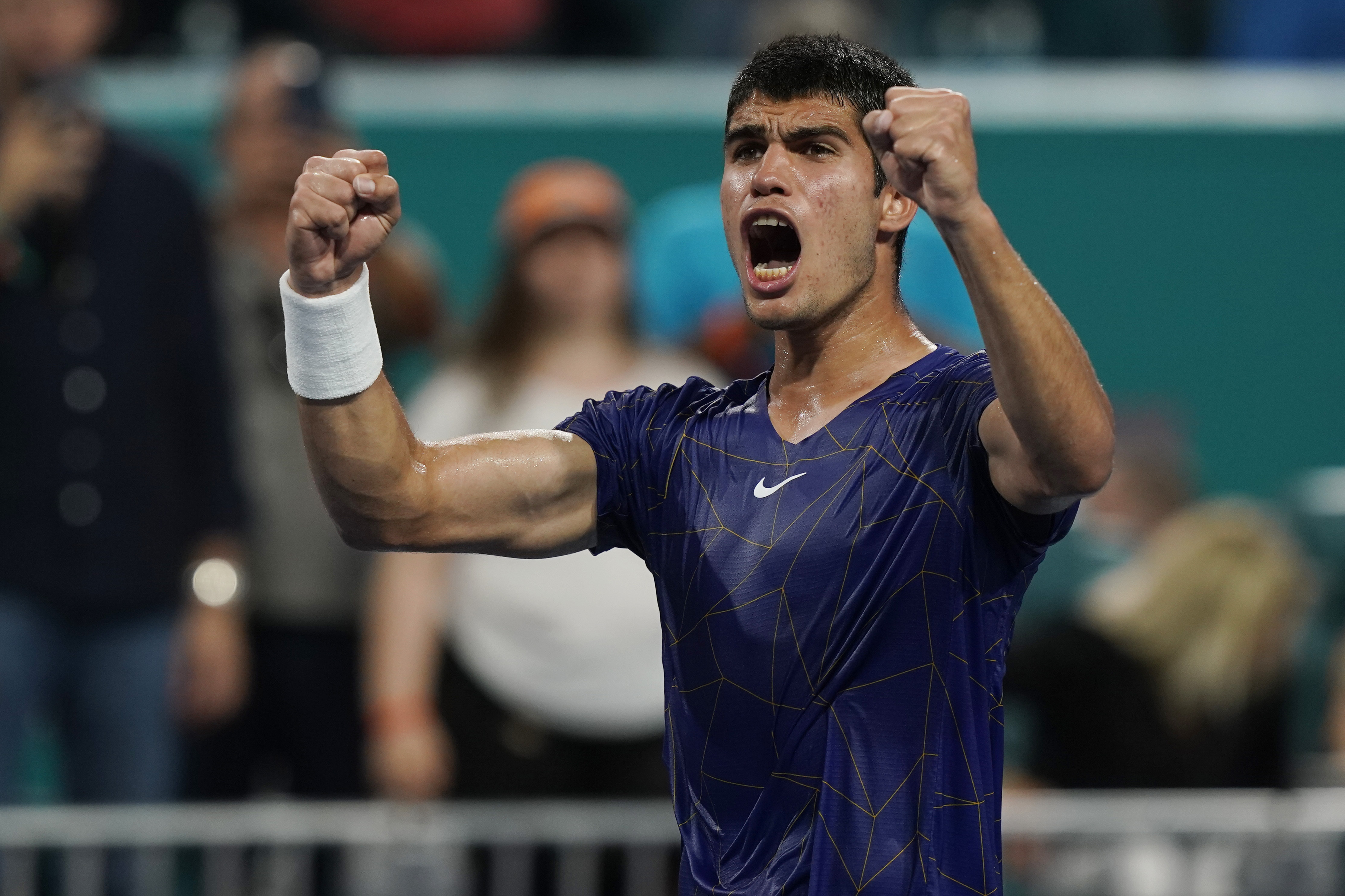 Carlos Alcaraz, of Spain, celebrates after defeating Hubert Hurkacz, of Poland, during the Miami Open tennis tournament semifinals Friday, April 1, 2022, in Miami Gardens, Fla. (AP Photo/Marta Lavandier)