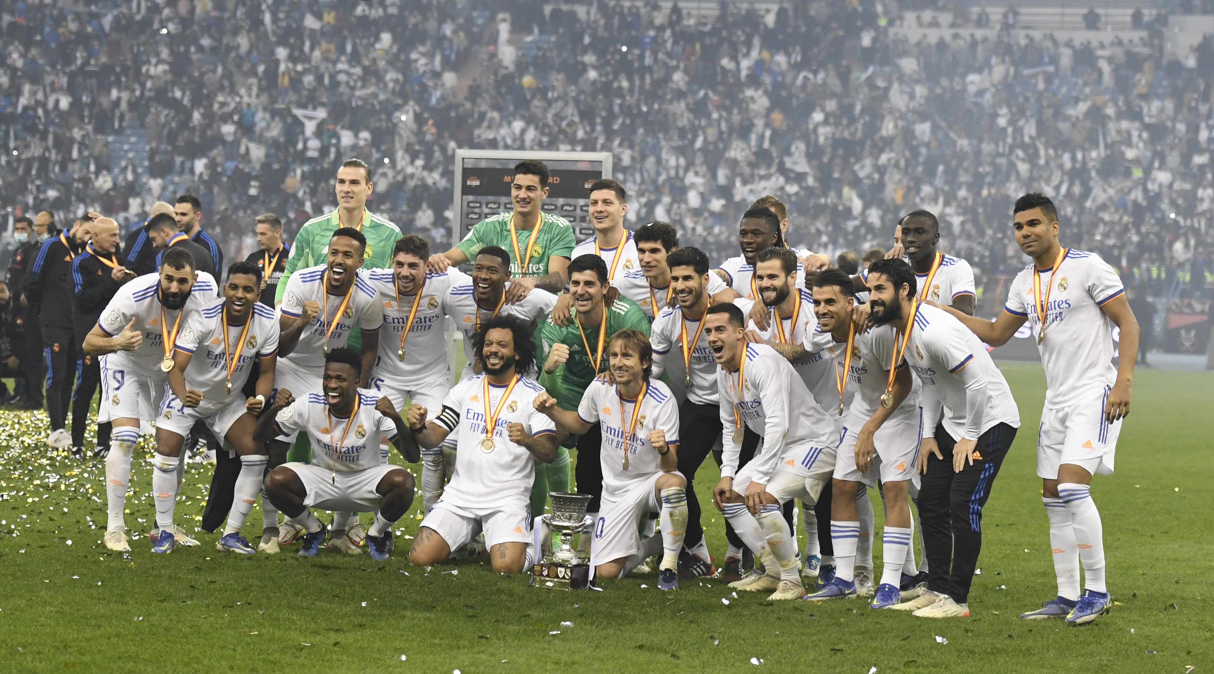 epa09690016 Real Madrid players pose with the trophy after winning the Spanish Super Cup soccer match between Athletic Bilbao and Real Madrid in Riyadh, Saudi Arabia, 16 January 2022.  EPA-EFE/STR
