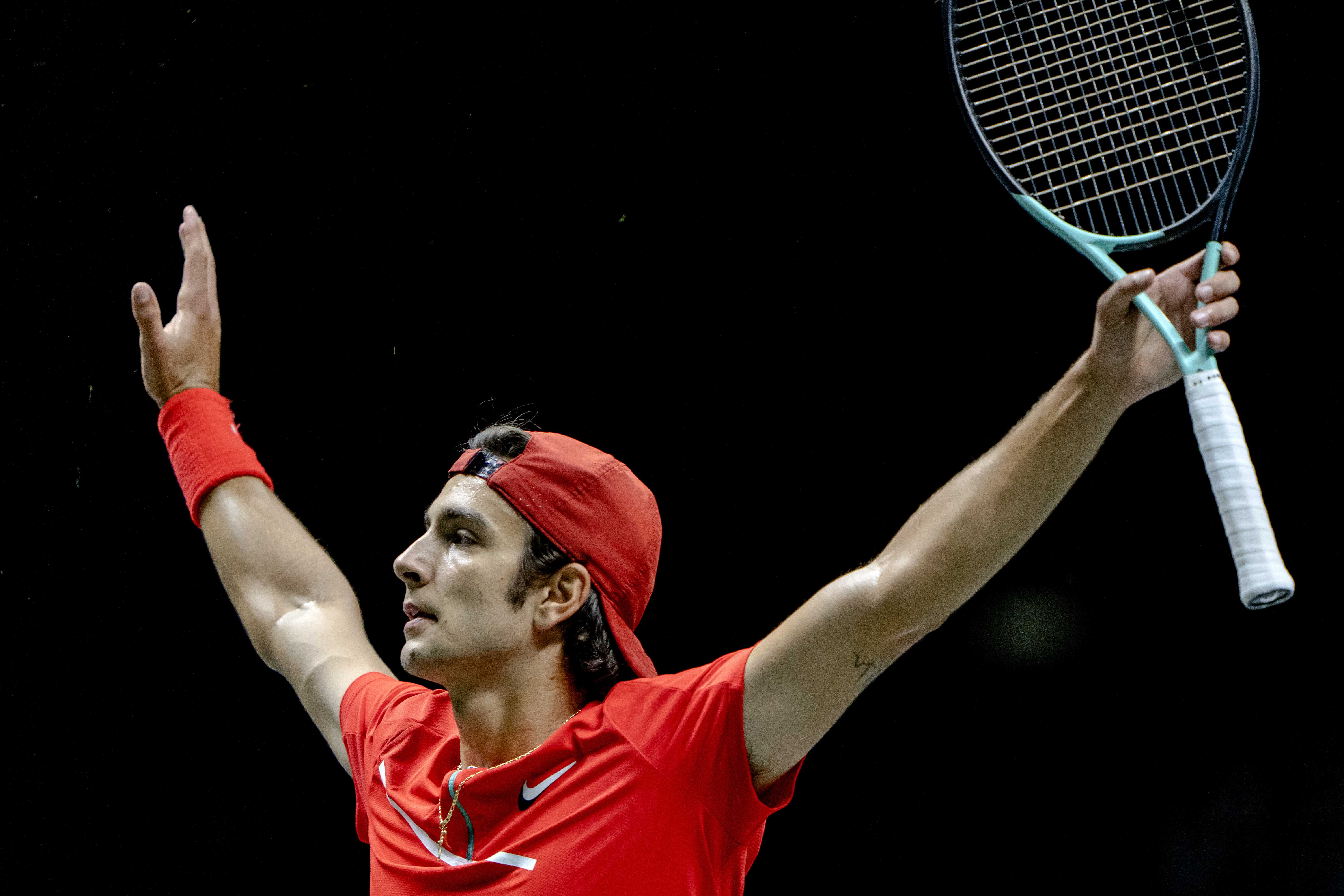 epa09741699 Lorenzo Musetti of Italy celebrates after winning his match against Hubert Hurkacz of Poland during the 49th ABN AMRO World Tennis Tournament in Rotterdam, The Netherlands, 09 February 2022.  EPA-EFE/SANDER KONING