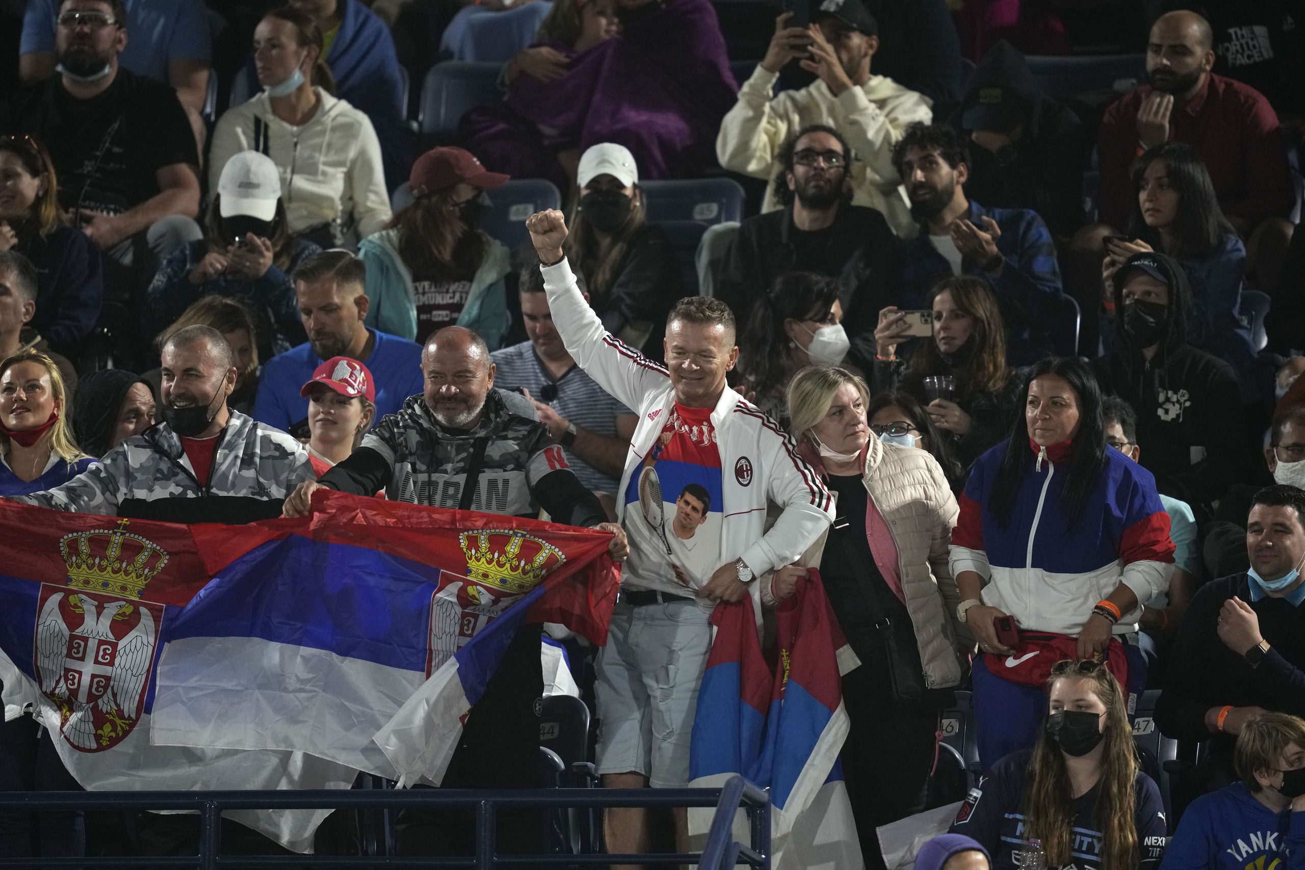 Serbia's Novak Djokovic fans cheer ahead of his first match during the Dubai Duty Free Tennis Championship against Italy's Lorenzo Musetti in Dubai, United Arab Emirates, Monday, Feb. 21, 2022. (AP Photo/Kamran Jebreili)