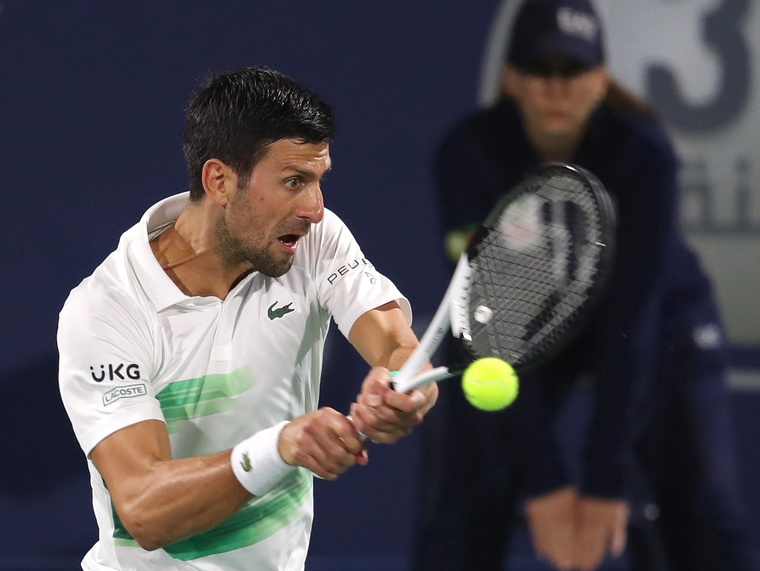 epa09781130 Novak Djokovic of Serbia in action during his quarter final match against Jiri Vesely of the Czech Republic at the Dubai Duty Free Tennis ATP Championships 2022 in Dubai, United Arab Emirates, 24 February 2022.  EPA-EFE/ALI HAIDER