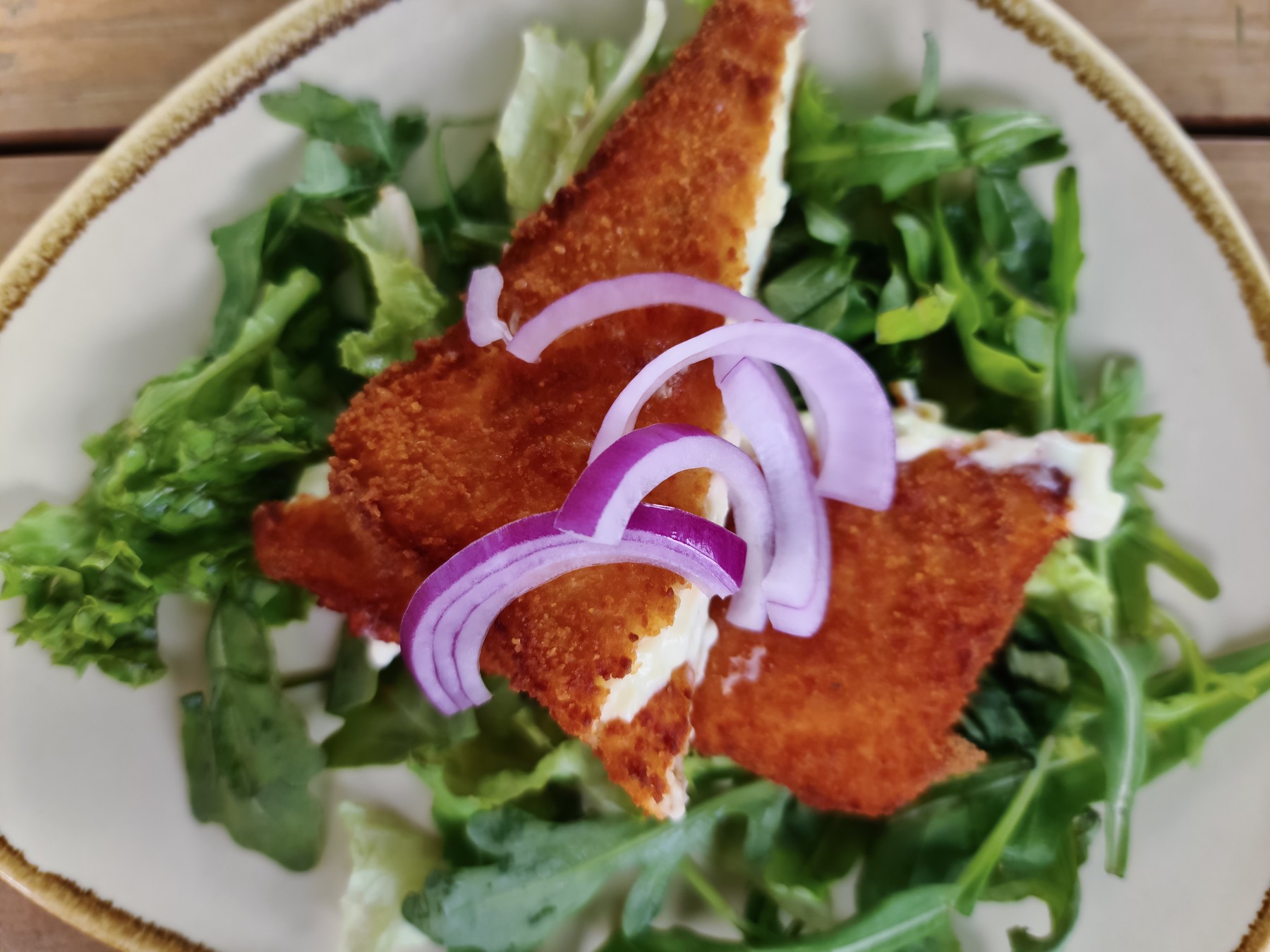 Fried saganaki cheese served on a plate with green salad,Image: 631984918, License: Royalty-free, Restrictions: , Model Release: no, Credit line: Michael Piepgras / Panthermedia / Profimedia