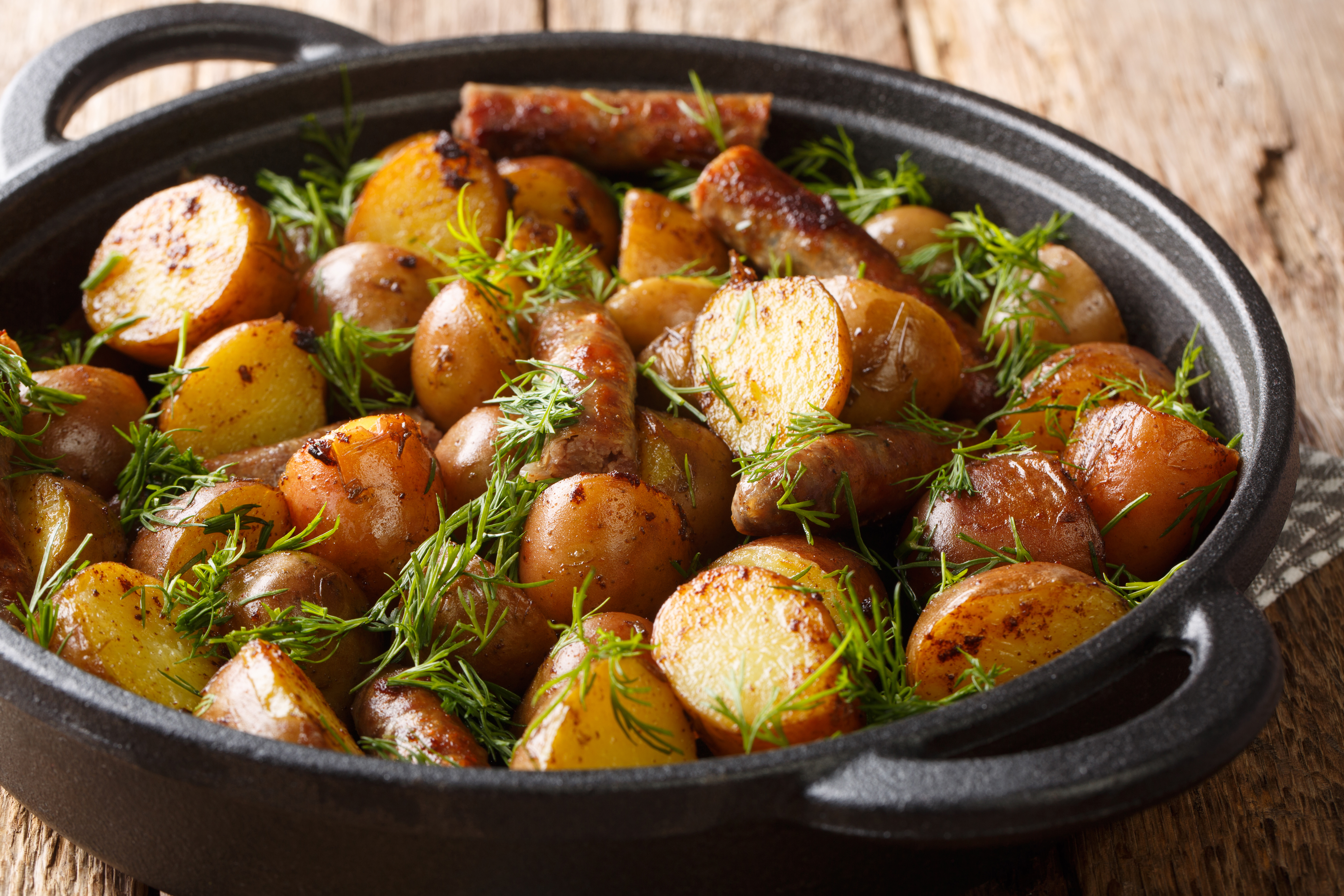 Traditional,Food,Fresh,Fried,Potatoes,With,Sausages,,Garlic,And,Dill