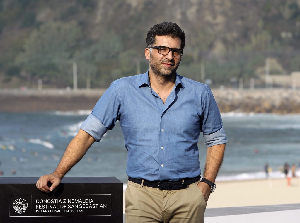 epa04417427 Bosnian filmmaker Danis Tanovic poses at the photocall for his movie 'Tigers' during the 62nd San Sebastian International Film Festival, in San Sebastian, Spain, 25 September 2014. The festival runs until 27 September.  EPA/JAVIER ETXEZARRETA
