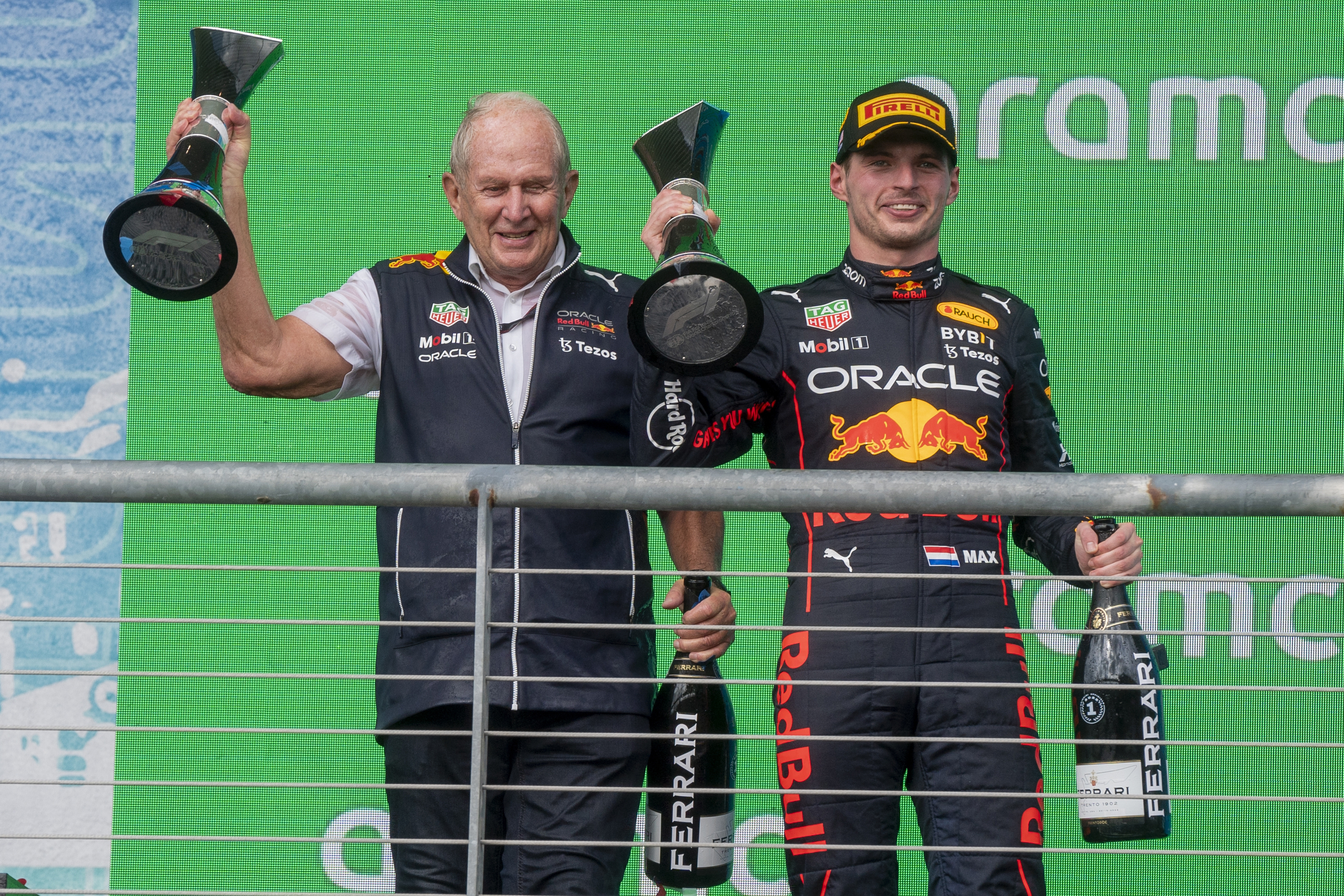 epa10261923 Dutch Formula one driver Max Verstappen (R) with Red Bull advisor Helmut Marko (L) on the podium of the United States Formula One Grand Prix at the Circuit of The Americas in Austin, Texas, USA, 23 October 2022.  EPA-EFE/SHAWN THEW