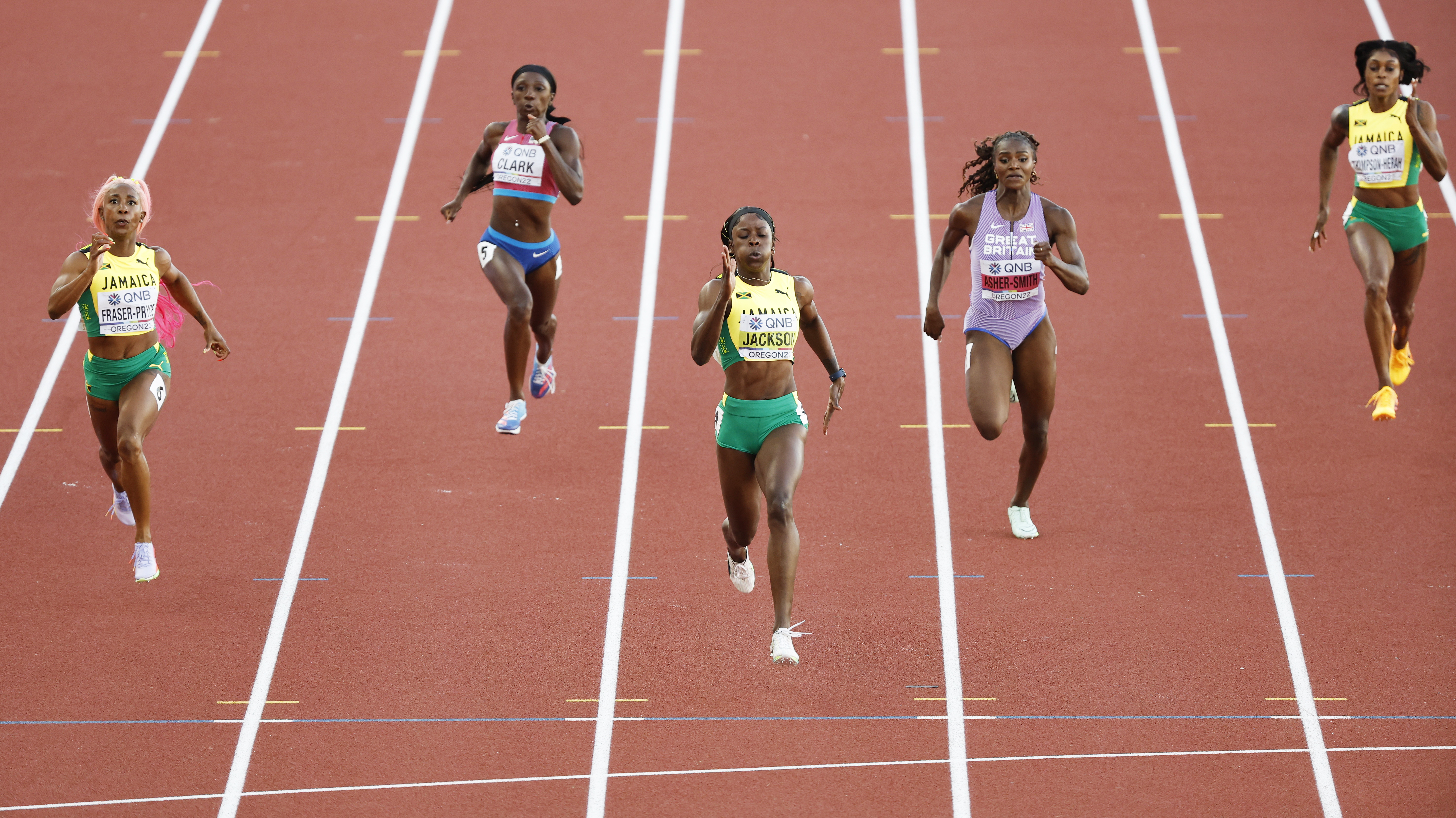 epa10085850 Shericka Jackson (C) of Jamaica wins the women's 200m final at the World Athletics Championships Oregon22 at Hayward Field in Eugene, Oregon, USA, 21 July 2022.  EPA-EFE/CJ Gunther