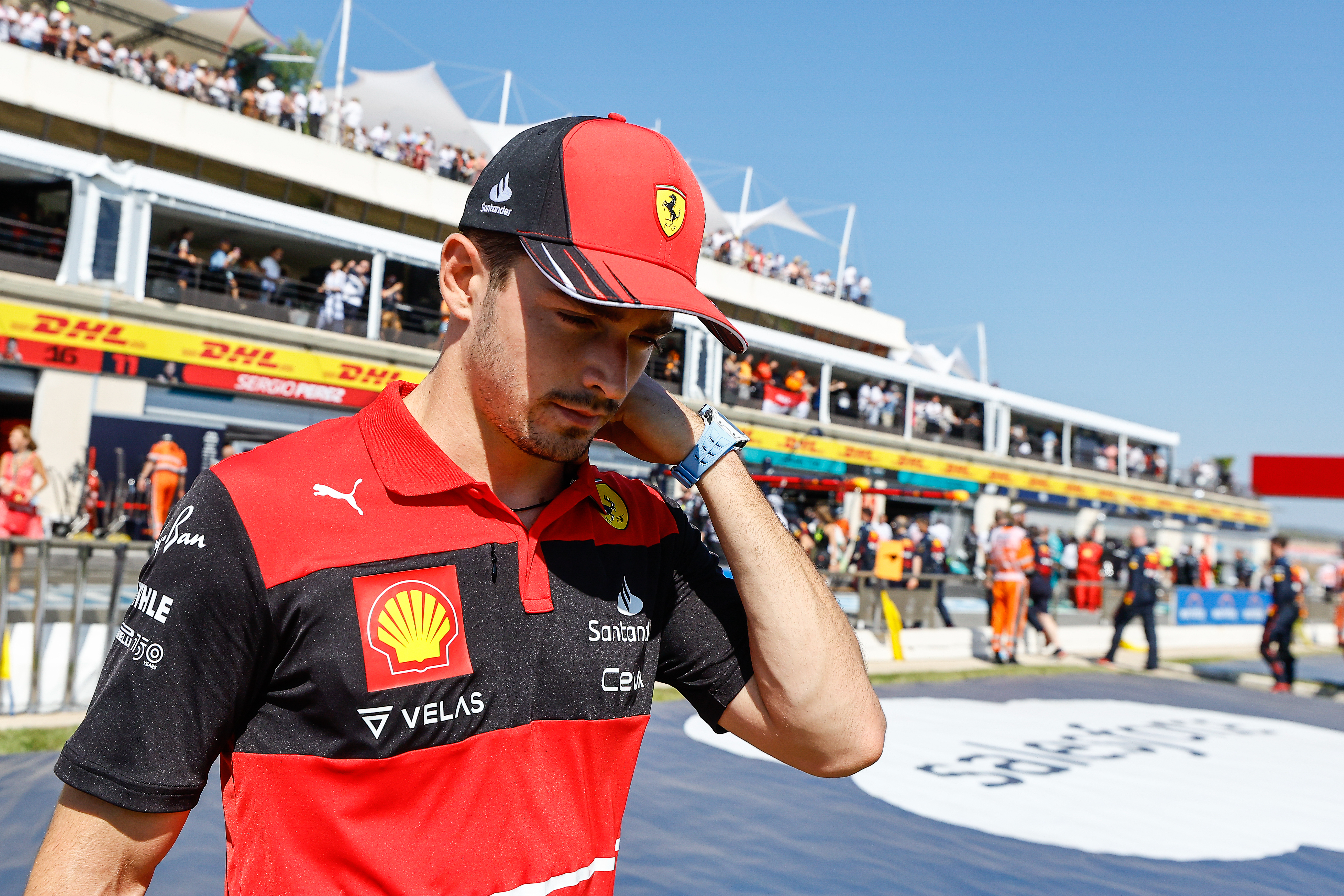 epa10089721 Monaco's Formula One driver Charles Leclerc of Scuderia Ferrari reacts during the Formula One Grand Prix of France at the Circuit Paul Ricard in Le Castellet, France, 24 July 2022.  EPA-EFE/ERIC GAILLARD / POOL