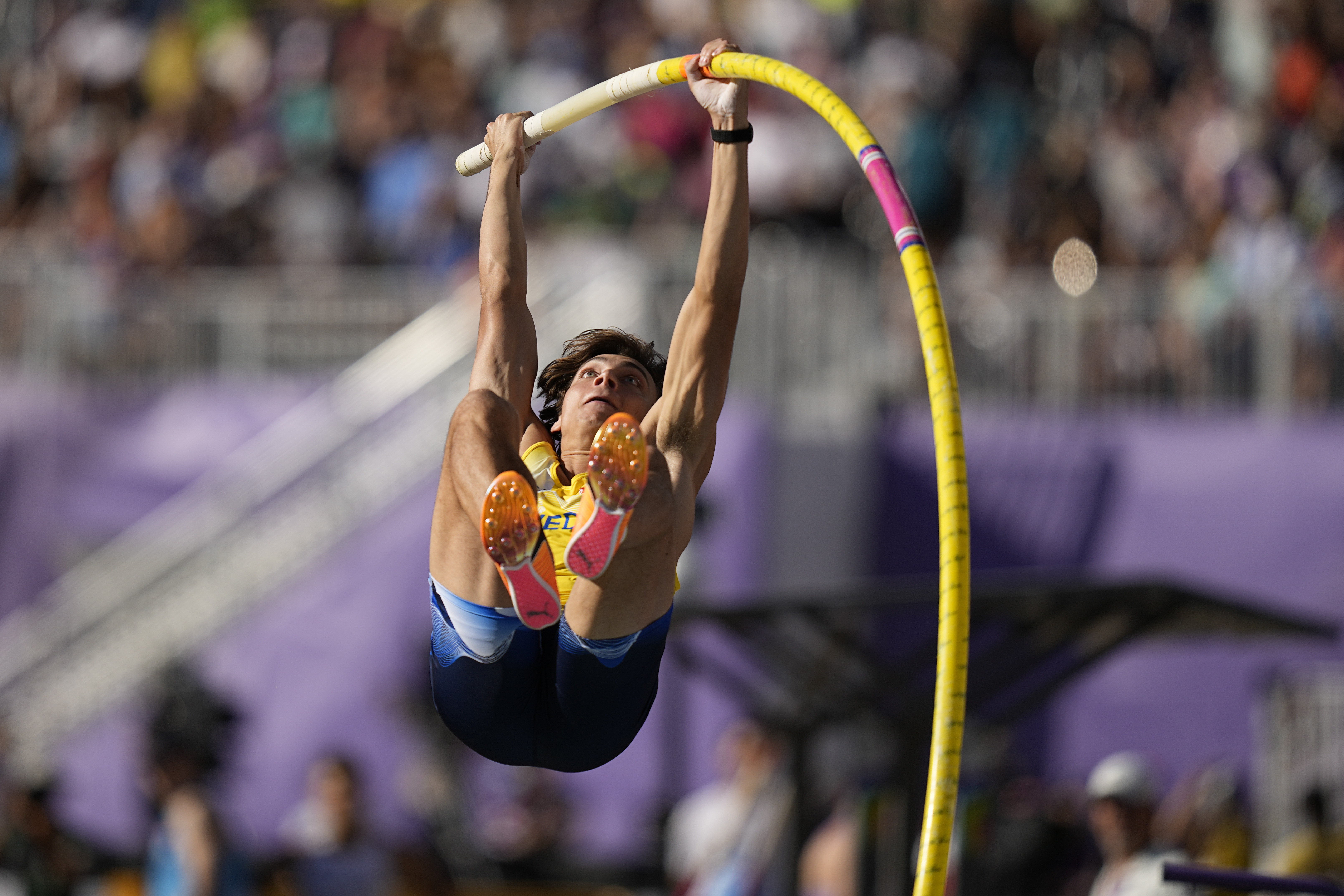 Armand Duplantis, of Sweden, competes in qualifications for the men's pole vault at the World Athletics Championships on Friday, July 22, 2022, in Eugene, Ore. (AP Photo/David J. Phillip)