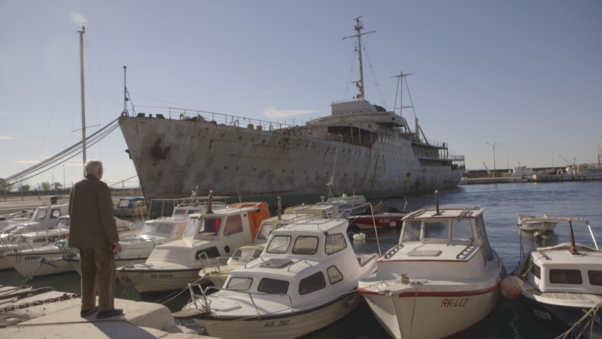 Stevan Labudović by President Tito’s ship “Galeb” in the port of Rijeka, Croatia. Starting in 1954, he sailed with the President on ‘Voyages of Peace’ to 18 countries on three continents_Photo Credit Poppy