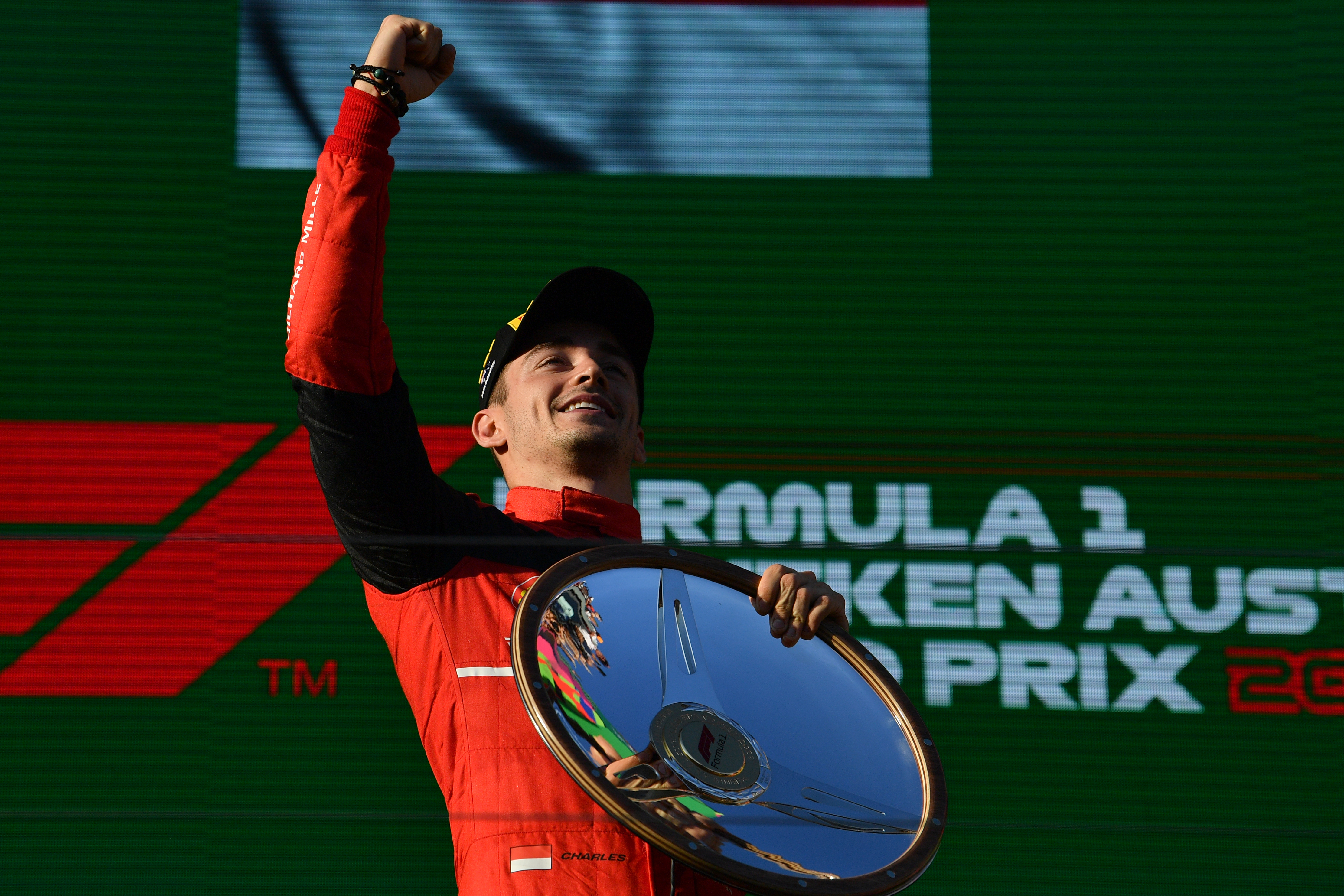 epa09881865 Charles Leclerc of Ferrari celebrates during the Formula 1 Australian Grand Prix 2022 at the Albert Park Grand Prix Circuit in Melbourne, Australia, 10 April 2022.  EPA-EFE/JOEL CARRETT AUSTRALIA AND NEW ZEALAND OUT