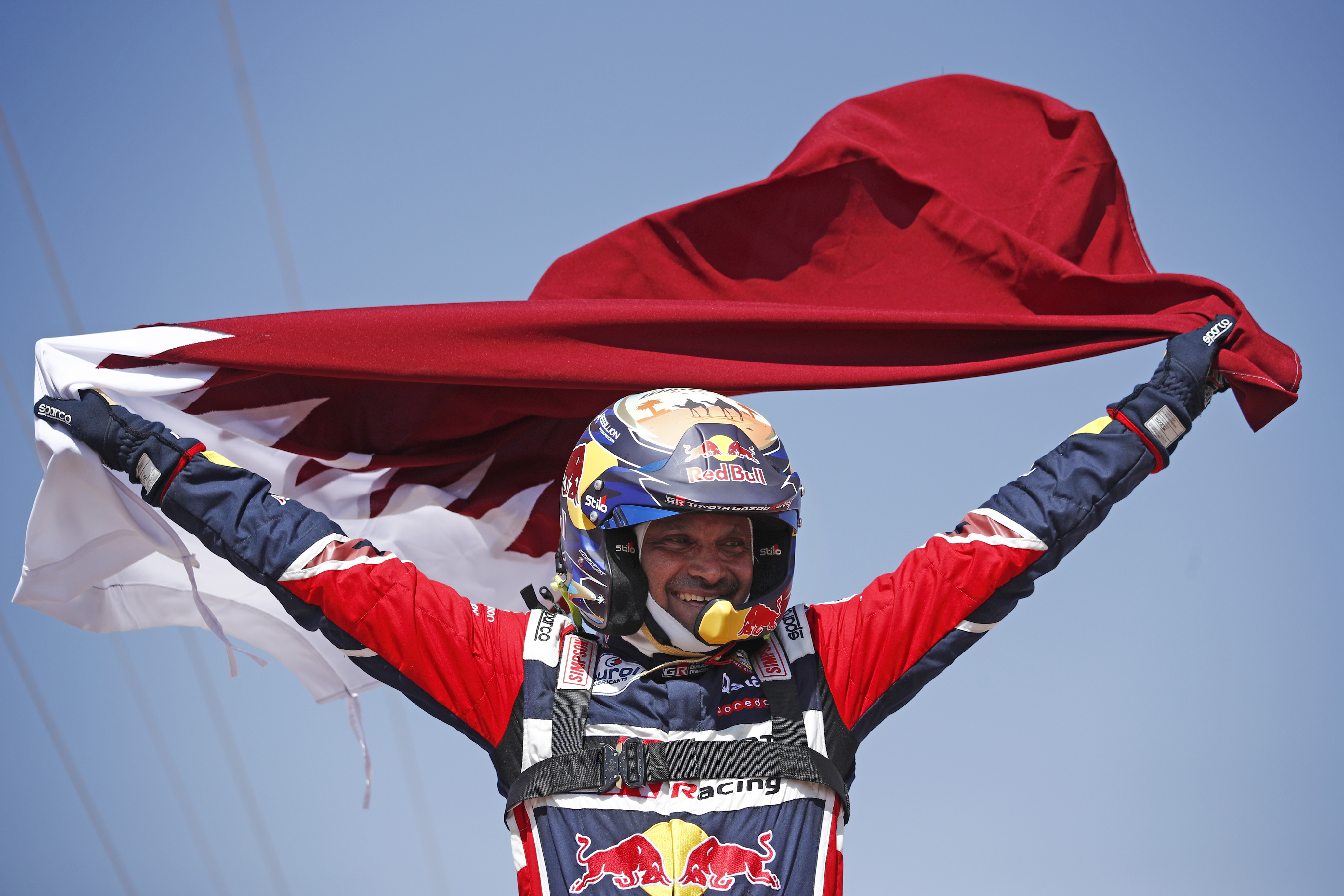 epa09684541 Qatari driver Nasser Al-Attiyah of the Toyota Gazoo Racing team celebrates after winning the Rally Dakar 2022 following the final and 12th stage between Bisha and Jeddah, Saudi Arabia, 14 January 2022.  EPA-EFE/YOAN VALAT