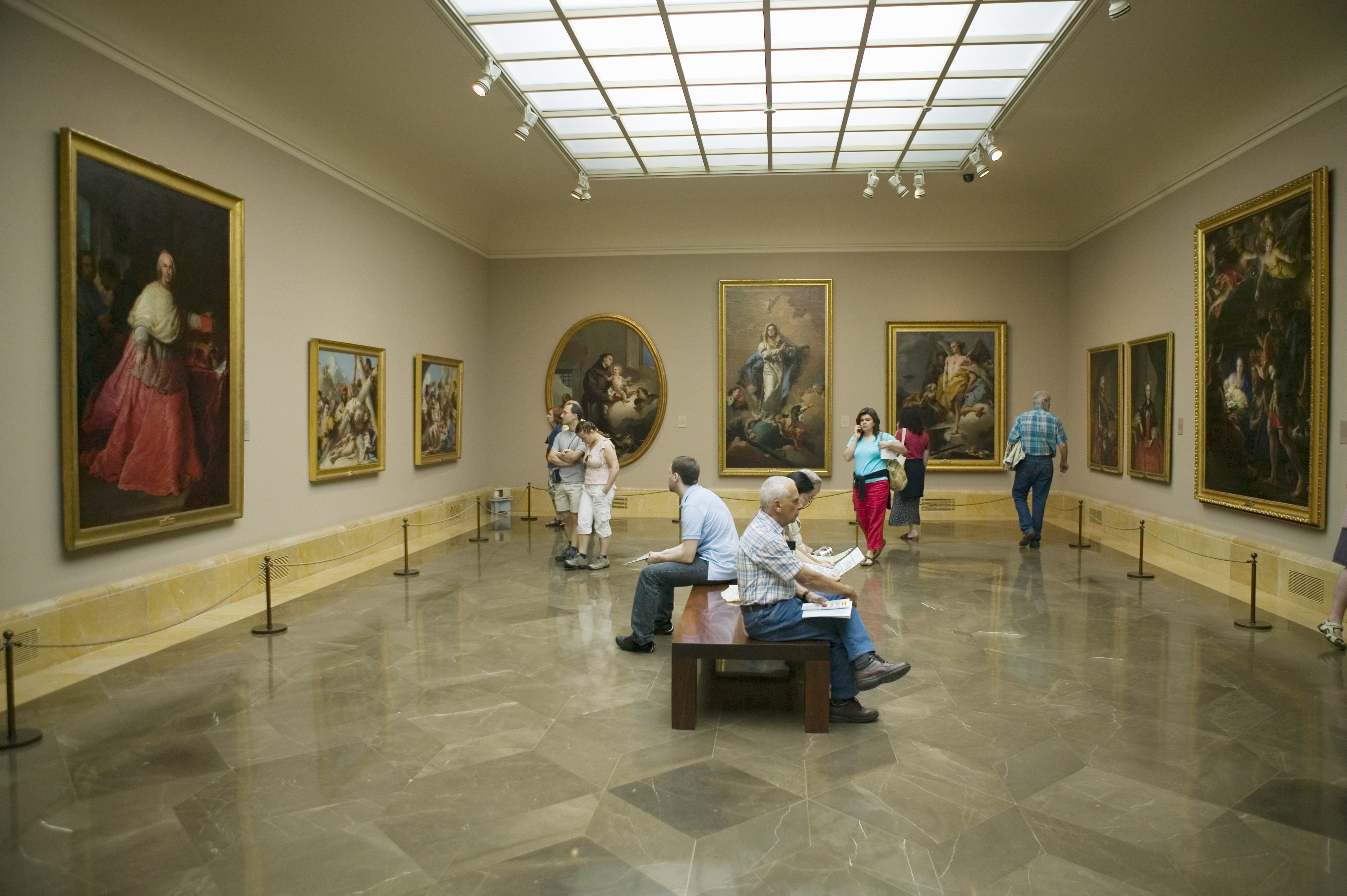 Art appreciators view paintings in Museum de Prado, Prado Museum, Madrid, Spain