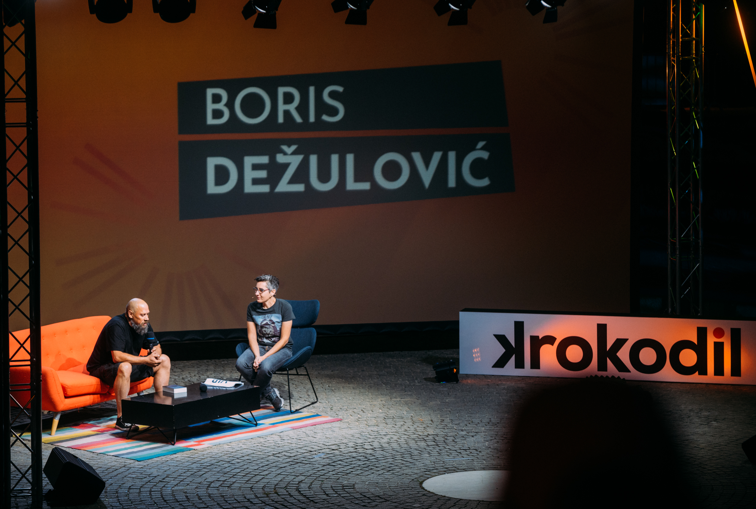 Krokodil festival, 18 jun, Boris Dežulović, Jasminka Petrović i Radivoj (Raša) Andrić, Ilija Đurović, mini kocert – Ana Ćurčin, Predrag Koraksić – CORAX, Tena Štivičić (scensko čitanje: Vladica Milosavljević i Hana Selimović) i Ana Marija Grbić.