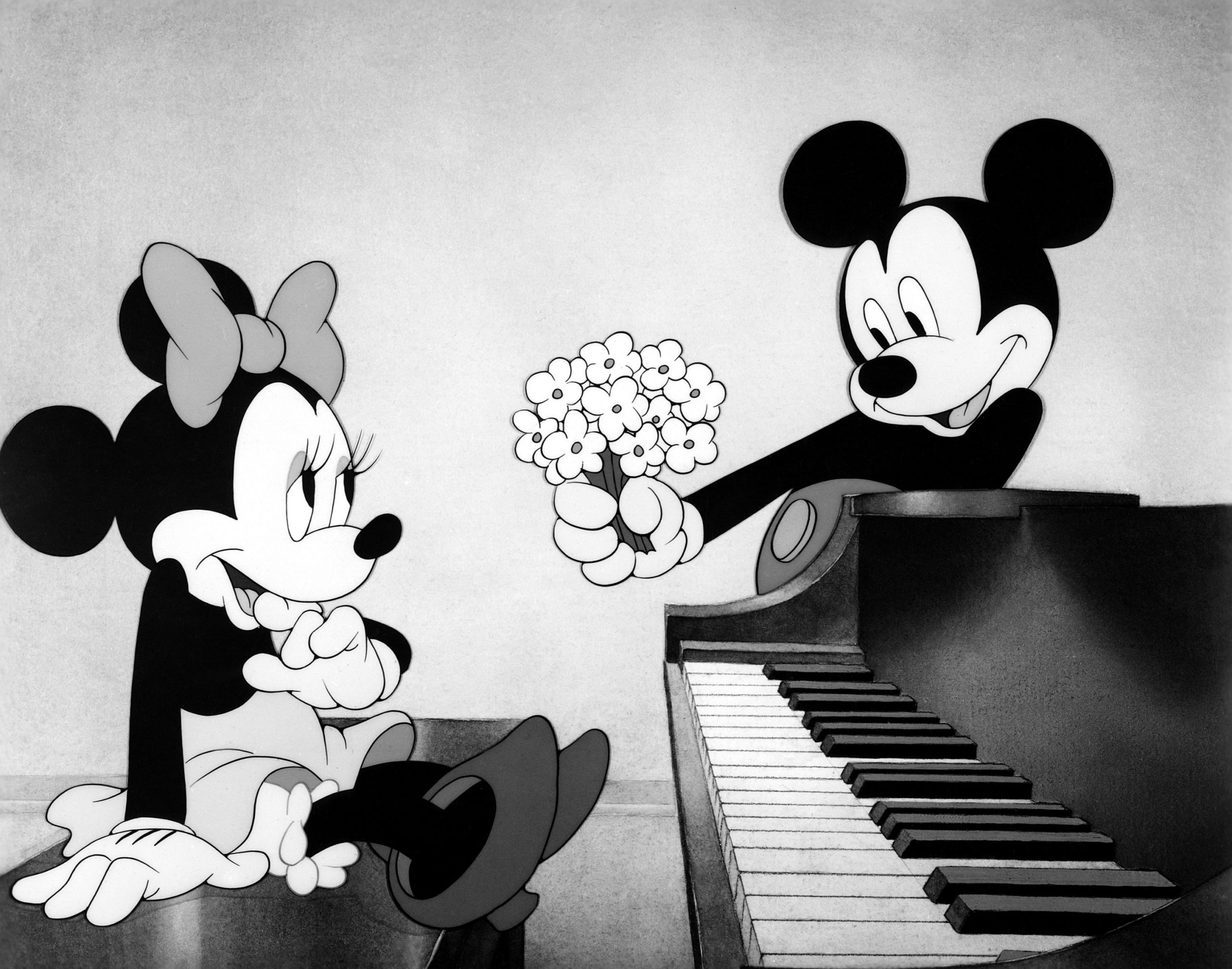 From left, Minnie Mouse, Mickey Mouse, ca. late 1930s.,Image: 635426456, License: Rights-managed, Restrictions: Please credit ©Walt Disney Co./Courtesy Everett Collection, Model Release: no, Credit line: Walt Disney Co. / Everett / Profimedia