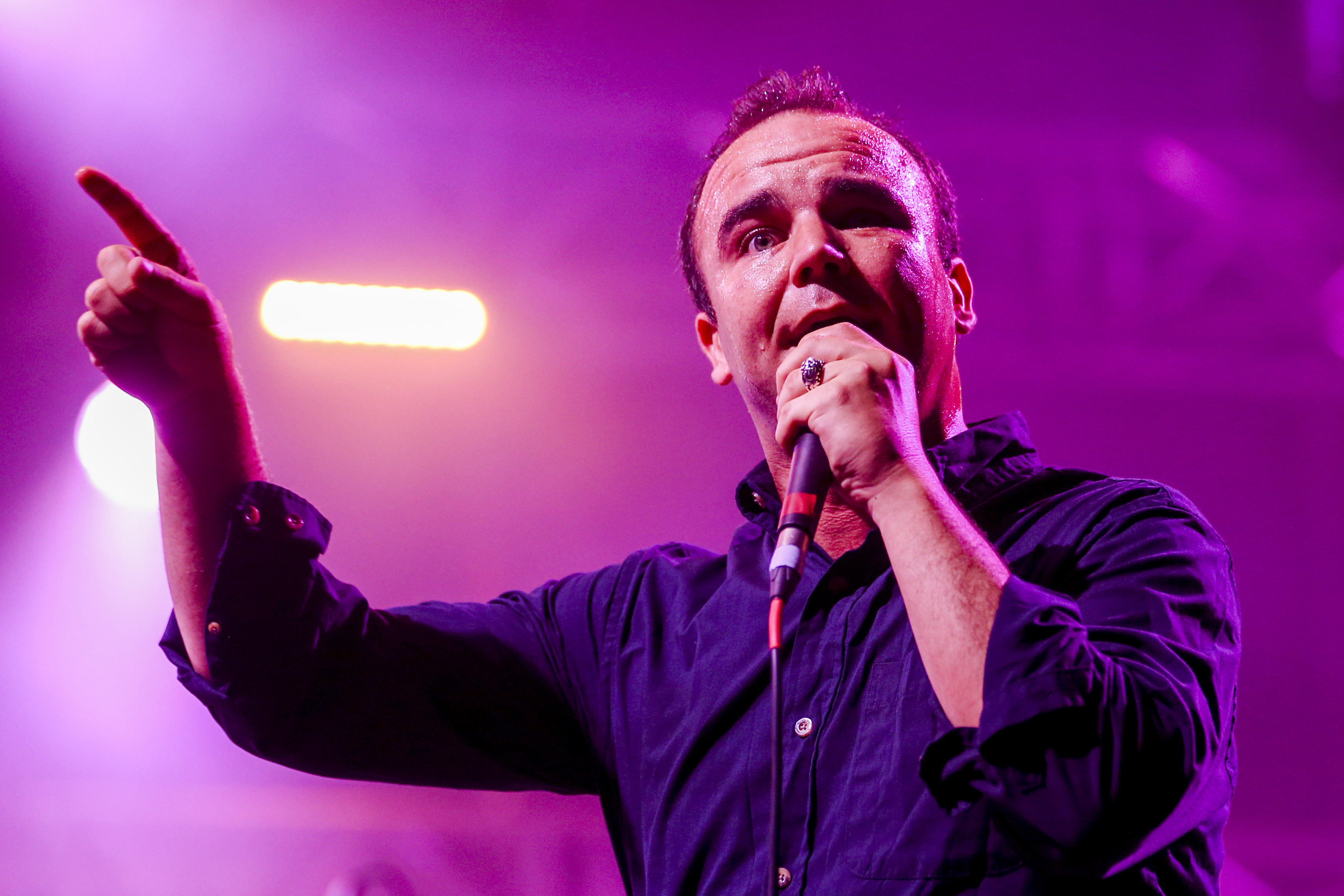 epa06887090 The lead singer of US Synthrock Band Future Islands, Samuel T. Herring, performs at the NOS Alive Festival in Oeiras, on the outskirts of Lisbon, Portugal, 13 July 2018. The festival runs from 12 to 14 July.  EPA-EFE/JOSE SENA GOULAO