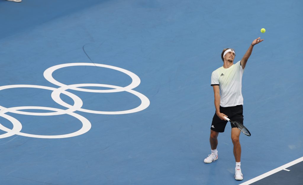 epa09379063 Alexander Zverev of Germany serves to Novak Djokovic of Serbia during the Men's Singles Semifinal Tennis events of the Tokyo 2020 Olympic Games at the Ariake Coliseum in? Tokyo, Japan, 30 July 2021.  EPA-EFE/RUNGROJ YONGRIT