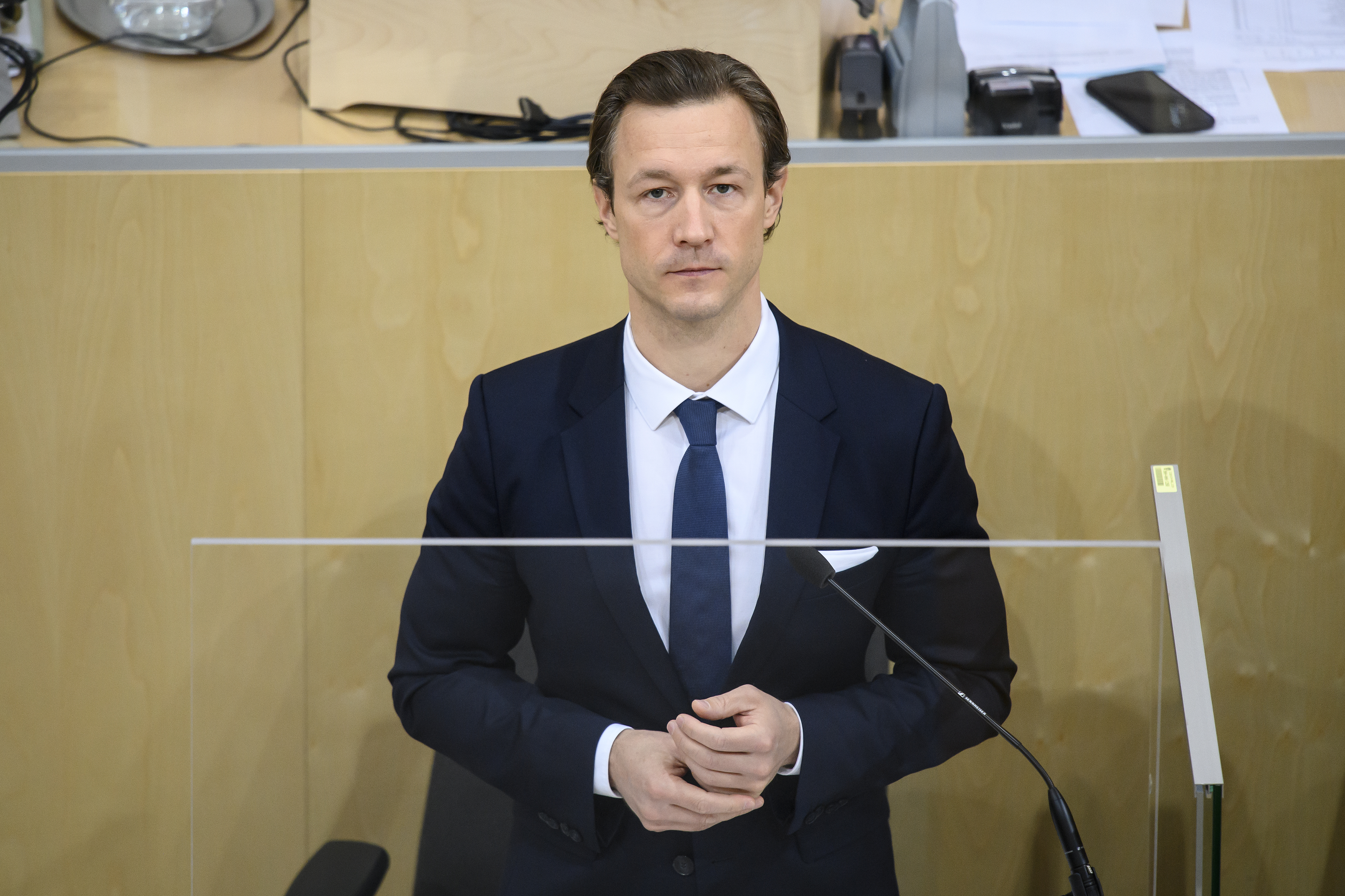 epa09521585 Austrian Finance Minister Gernot Bluemel delivers a budget speech during a session of the Austrian parliament at the temporary parliament building at the Hofburg Palace in Vienna, Austria, 13 October 2021.  EPA-EFE/CHRISTIAN BRUNA