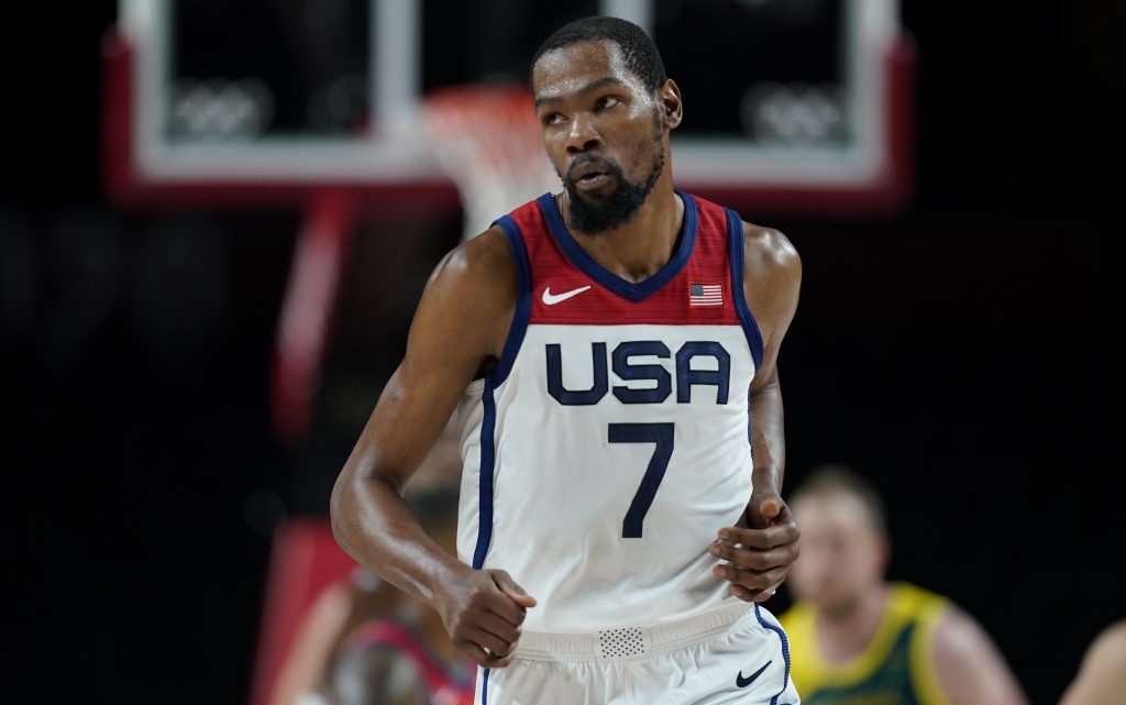 United States's Kevin Durant (7) runs up the court after making a three point basket during men's basketball semifinal game against Australia at the 2020 Summer Olympics, Thursday, Aug. 5, 2021, in Saitama, Japan. (AP Photo/Charlie Neibergall)