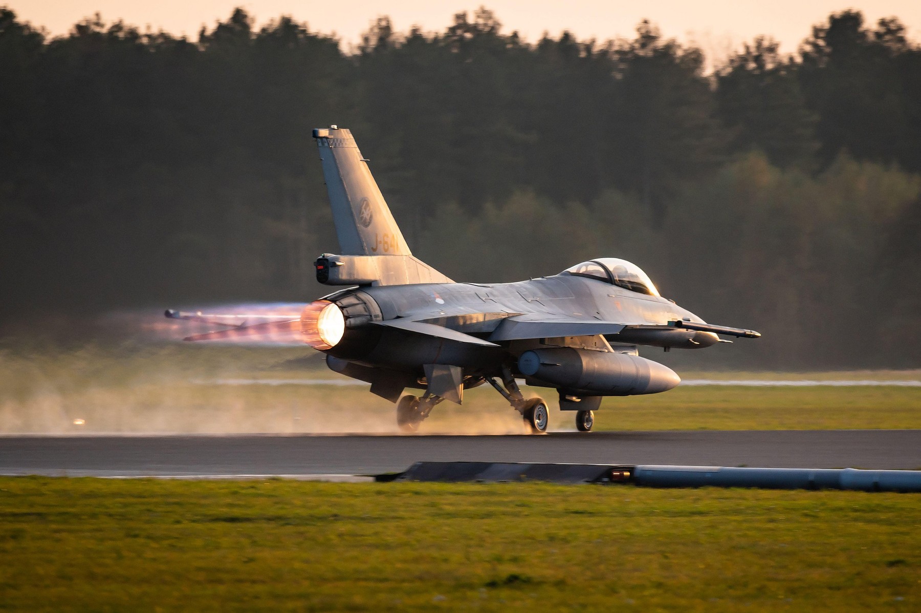 A F-16 Fighting Falcon fighter jet of the Royal Netherlands Air Force is ready for take-off from the Volkel Air Base.