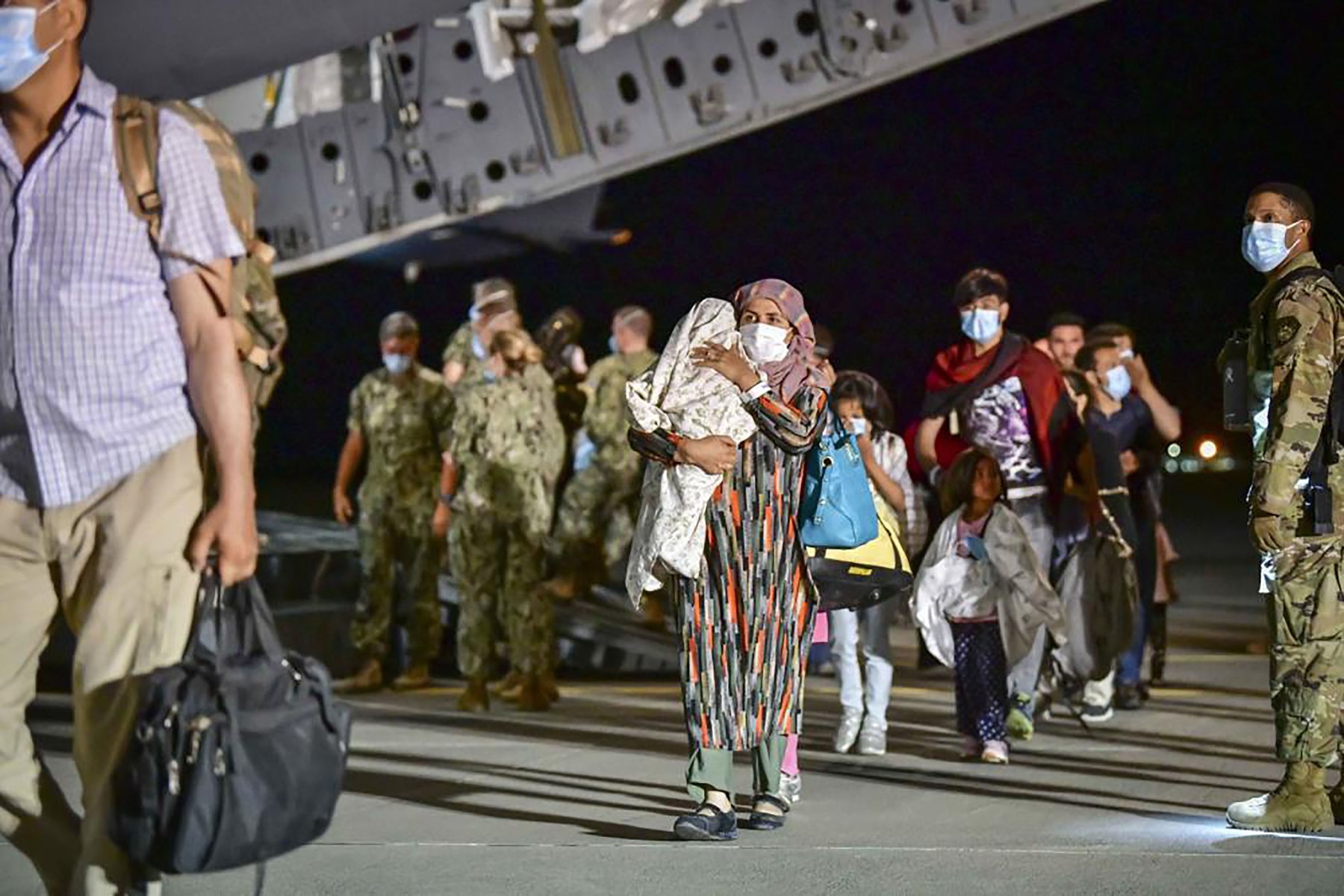 Afghan Refugees Arrive at US Naval Air Station Sigonella