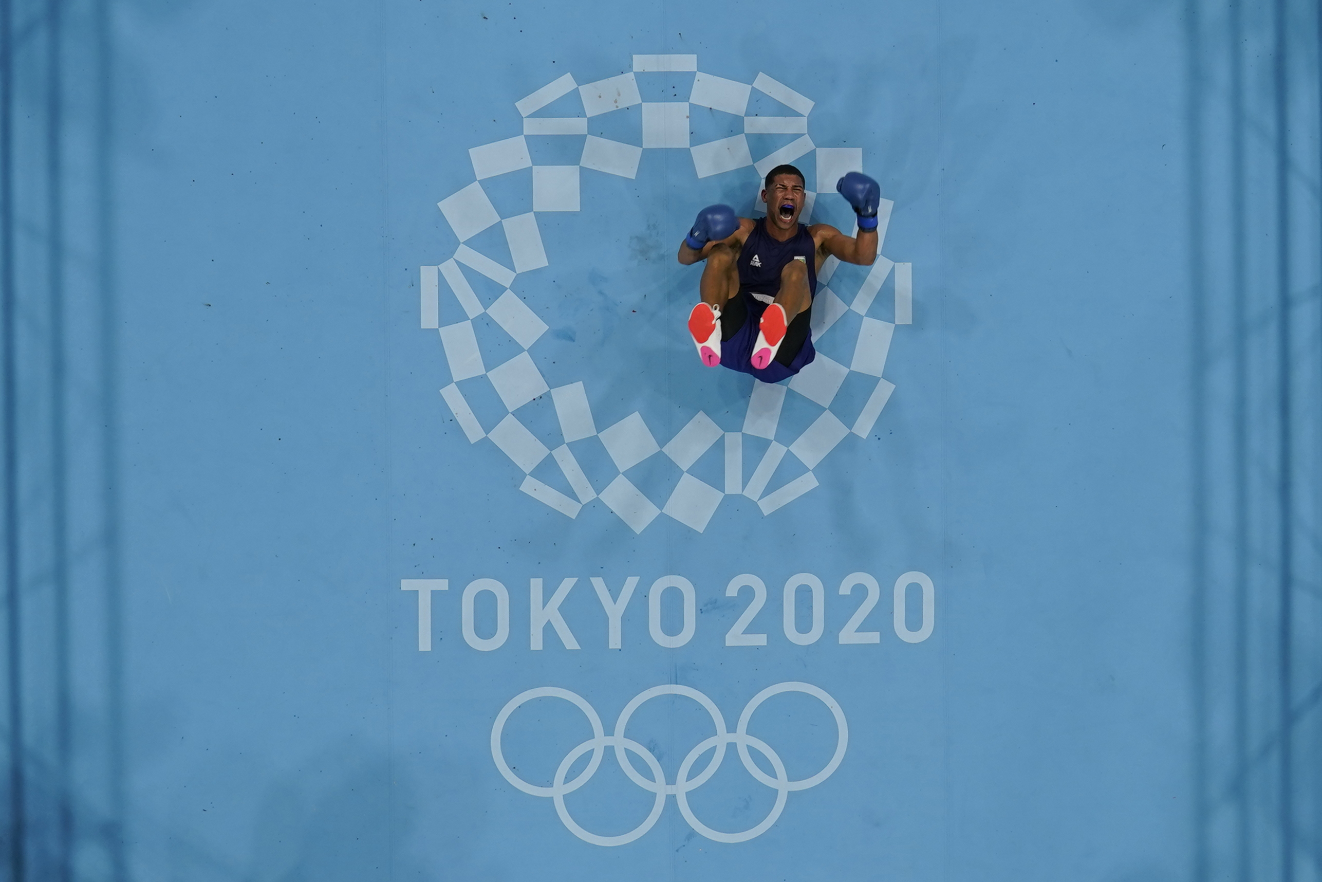 Brazil's Hebert Sousa celebrates winning his men's middleweight 75-kg boxing gold medal match against Ukraine's Oleksandr Khyzhniak at the 2020 Summer Olympics, Saturday, Aug. 7, 2021, in Tokyo, Japan. (AP Photo/Frank Franklin II)