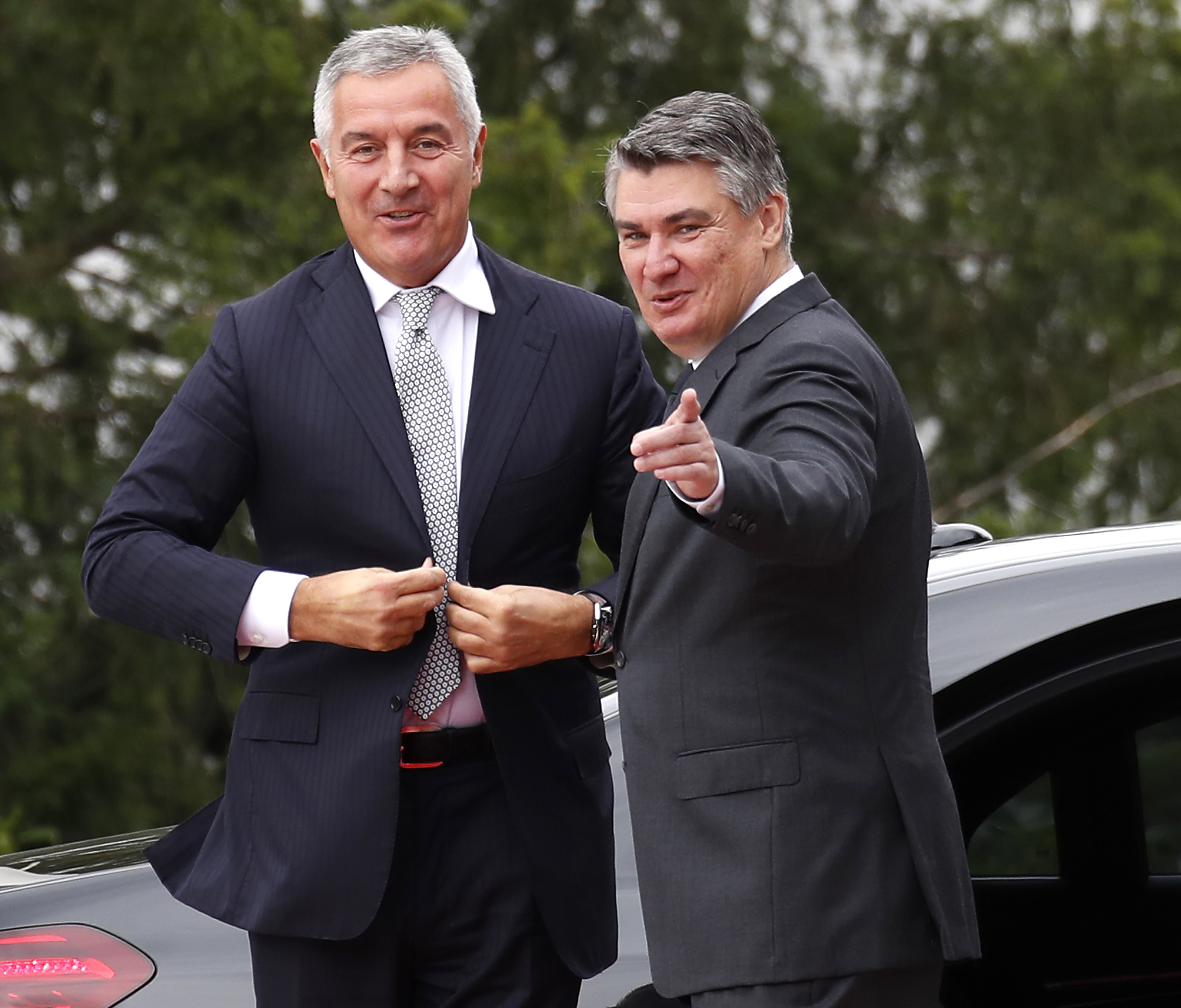 epa09471131 Croatian President Zoran Milanovic (R) welcomes Montenegrin President Milo Djukanovic (L) during his official visit in Zagreb, Croatia, 16 September 2021. Djukanovic is on a two-day official visit to Croatia.  EPA-EFE/ANTONIO BAT