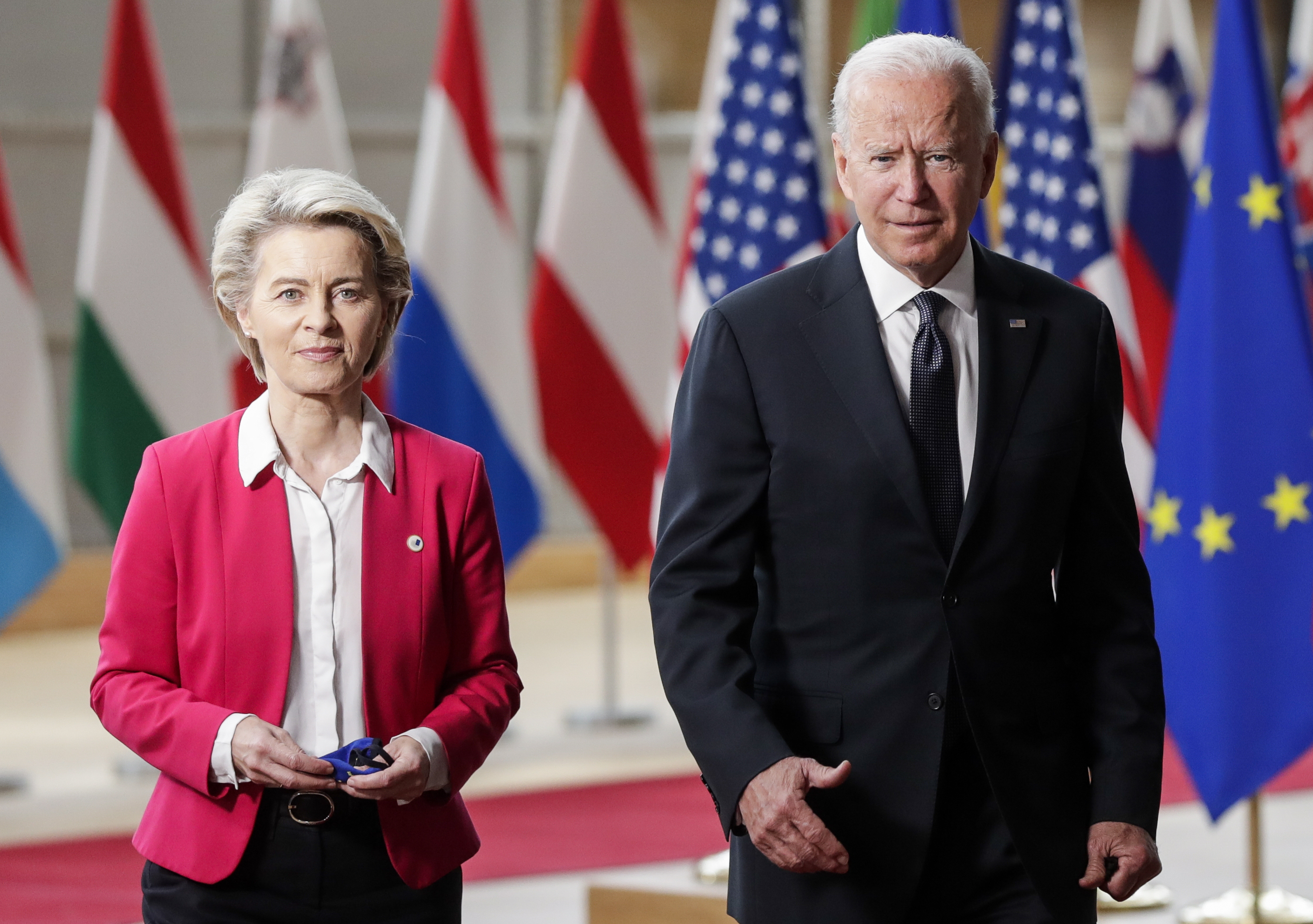 epa09272660 US president Joe Biden (R) is welcomed by President of the European Commission Ursula von der Leyen (L) ahead to the EU-US summit at the European Council in Brussels, Belgium, 15 June 2021.  EPA-EFE/OLIVIER HOSLET