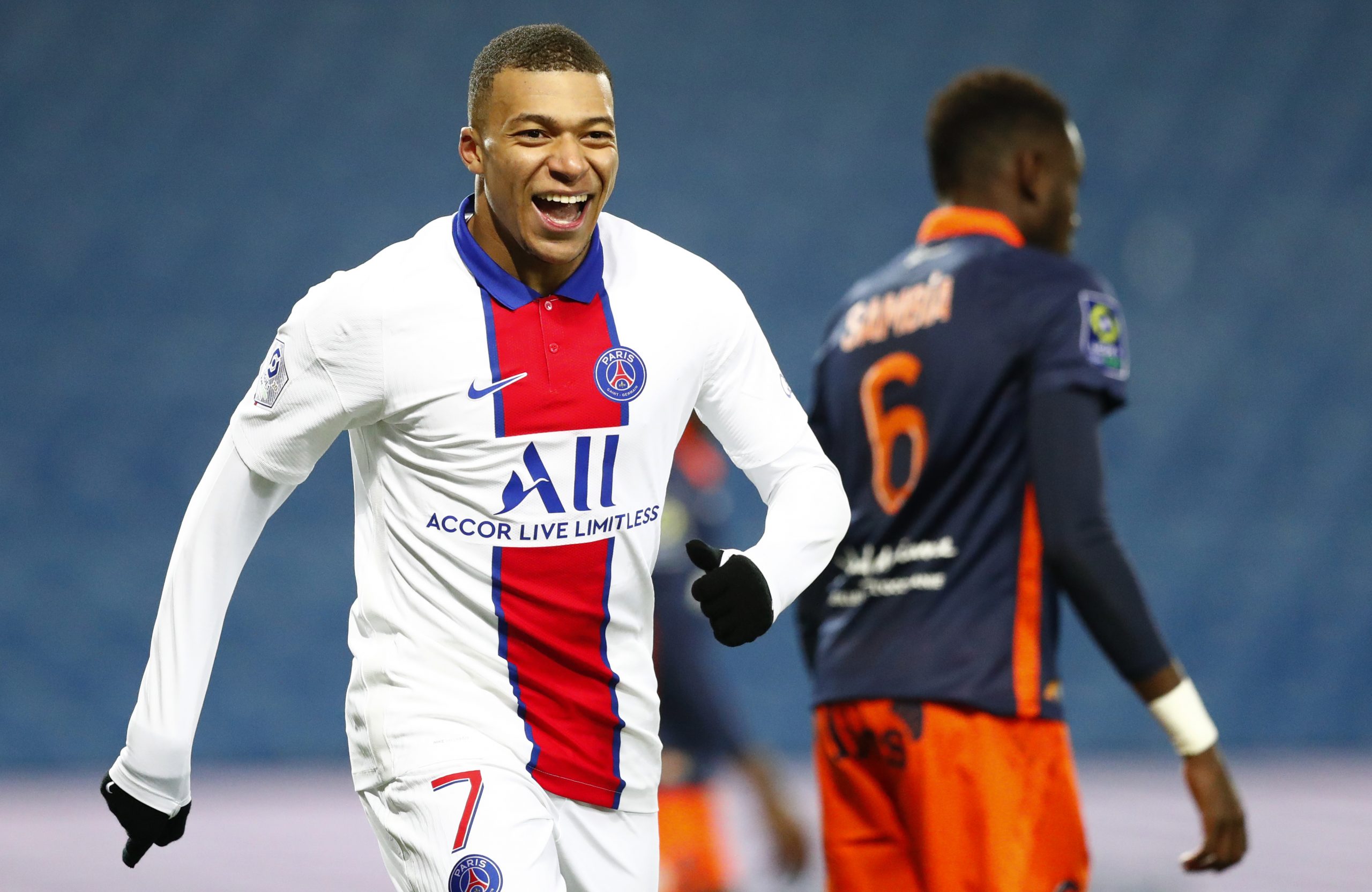 epa08865389 Kylian Mbappe of Paris Saint Germain celebrates a goal during the French Ligue 1 soccer match between Montpellier HSC and Paris Saint Germain, in Montpellier, France, 05 December 2020.  EPA-EFE/Guillaume Horcajuelo