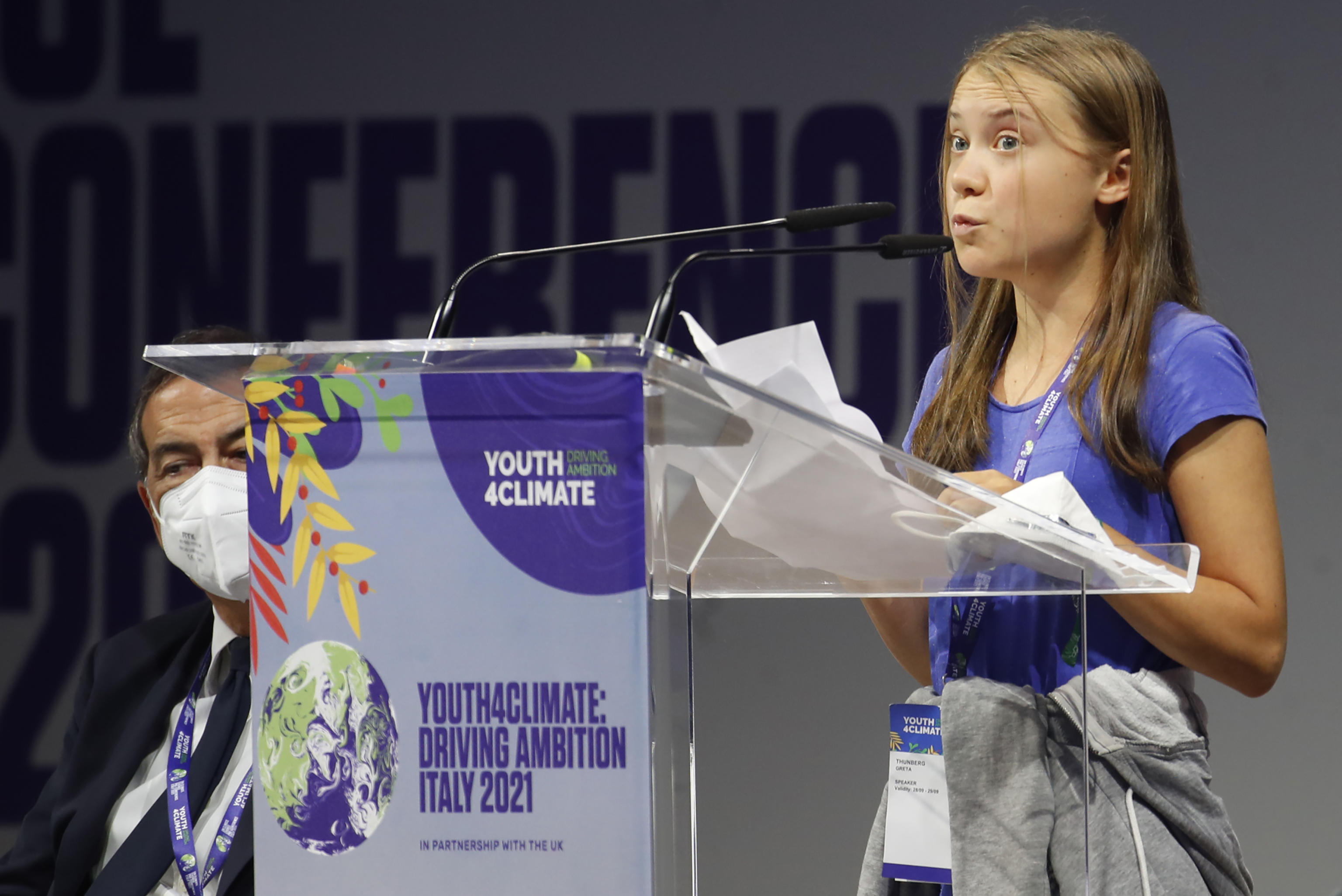 epa09492519 Swedish environmental activist Greta Thunberg speaks at the conference 'Youth4climate: driving ambition Italy 2021' in Milan, Italy, 28 September 2021.  EPA-EFE/MATTEO BAZZI