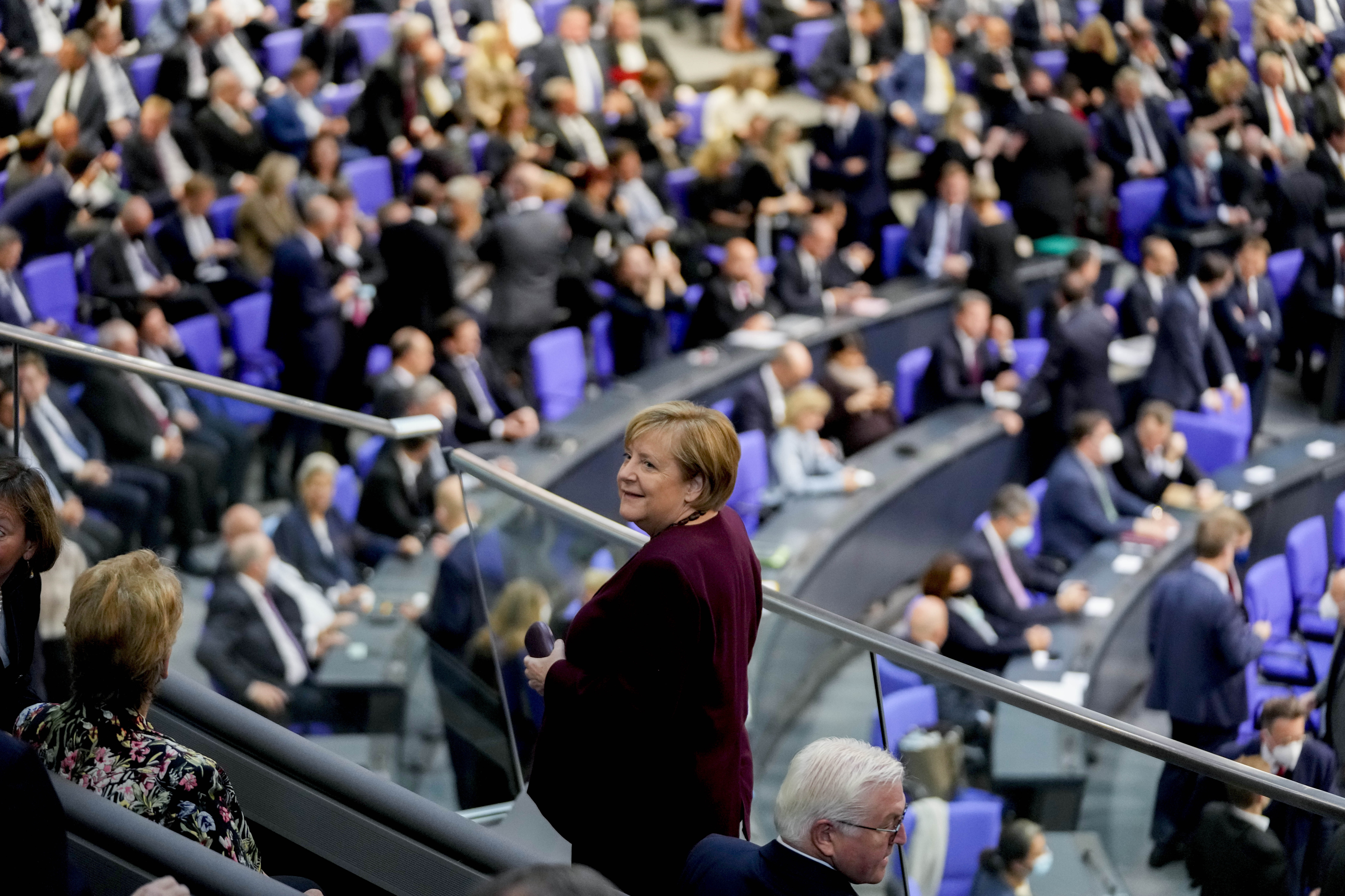 German Chancellor Angela Merkel looks around during the first plenary session of the German parliament Bundestag after the elections, Berlin, Tuesday, Oct. 26, 2021. (Photo/Markus Schreiber)