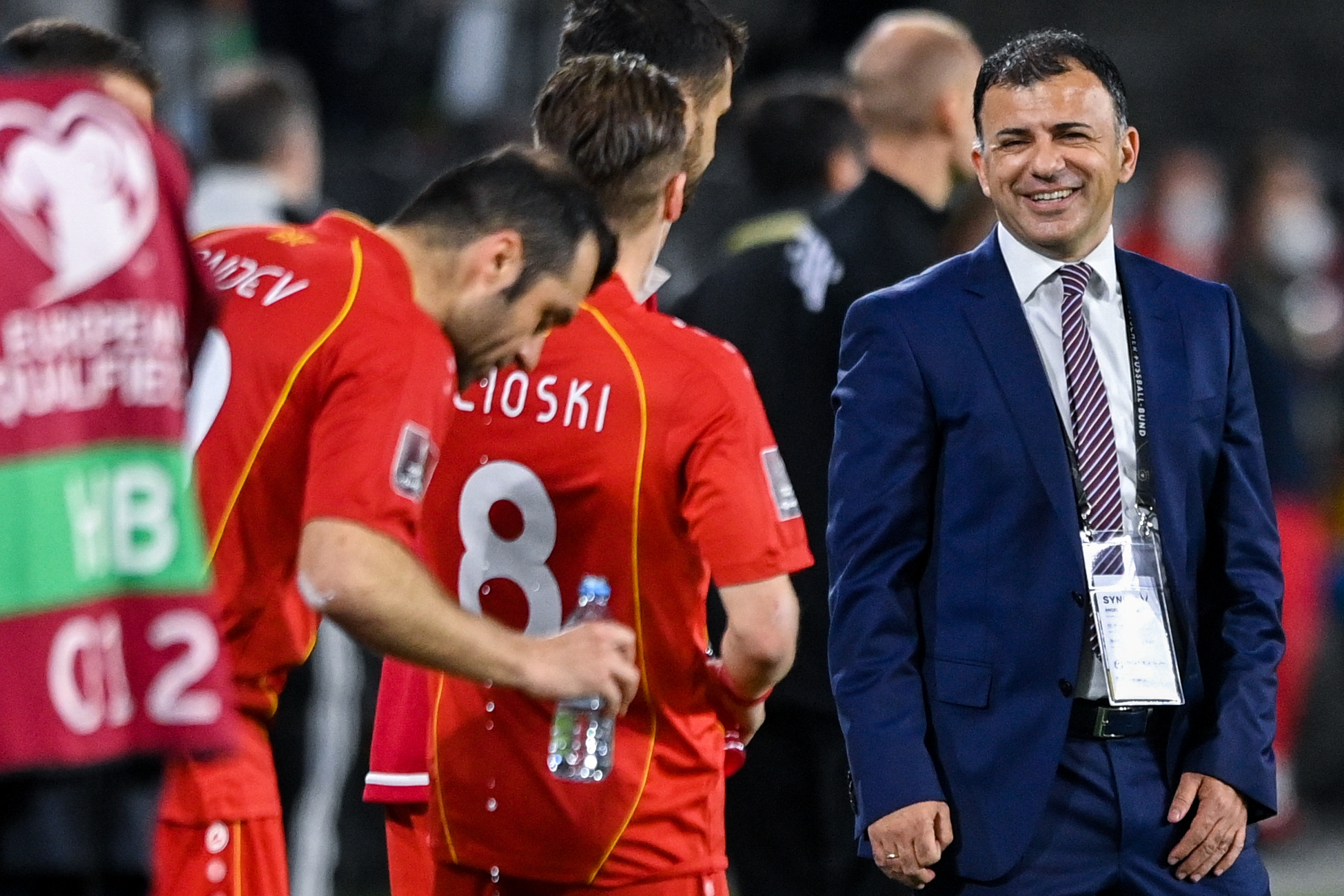 epa09109587 North Macedonia's head coach Igor Angelovski (R) after the match during the FIFA World Cup 2022 qualifying soccer match between Germany and North Macedonia in Duisburg, Germany, 31 March 2021.  EPA-EFE/SASCHA STEINBACH