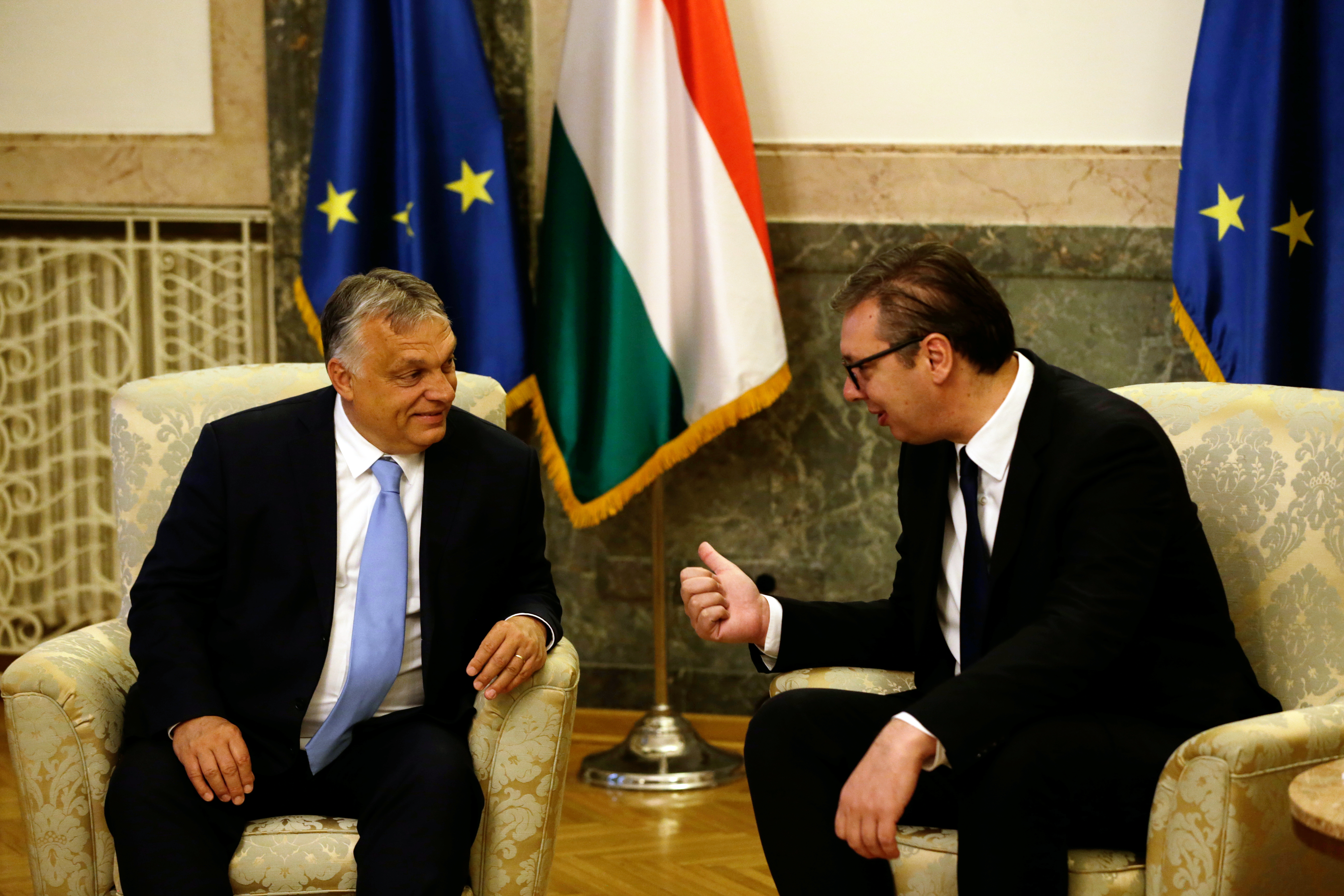 epa09330813 Serbian President Aleksandar Vucic (R) talks with Hungarian Prime Minister Viktor Orban (L) during their meeting in Belgrade, Serbia, 08 July 2021. Orban is on an official visit to Serbia.  EPA-EFE/ANDREJ CUKIC