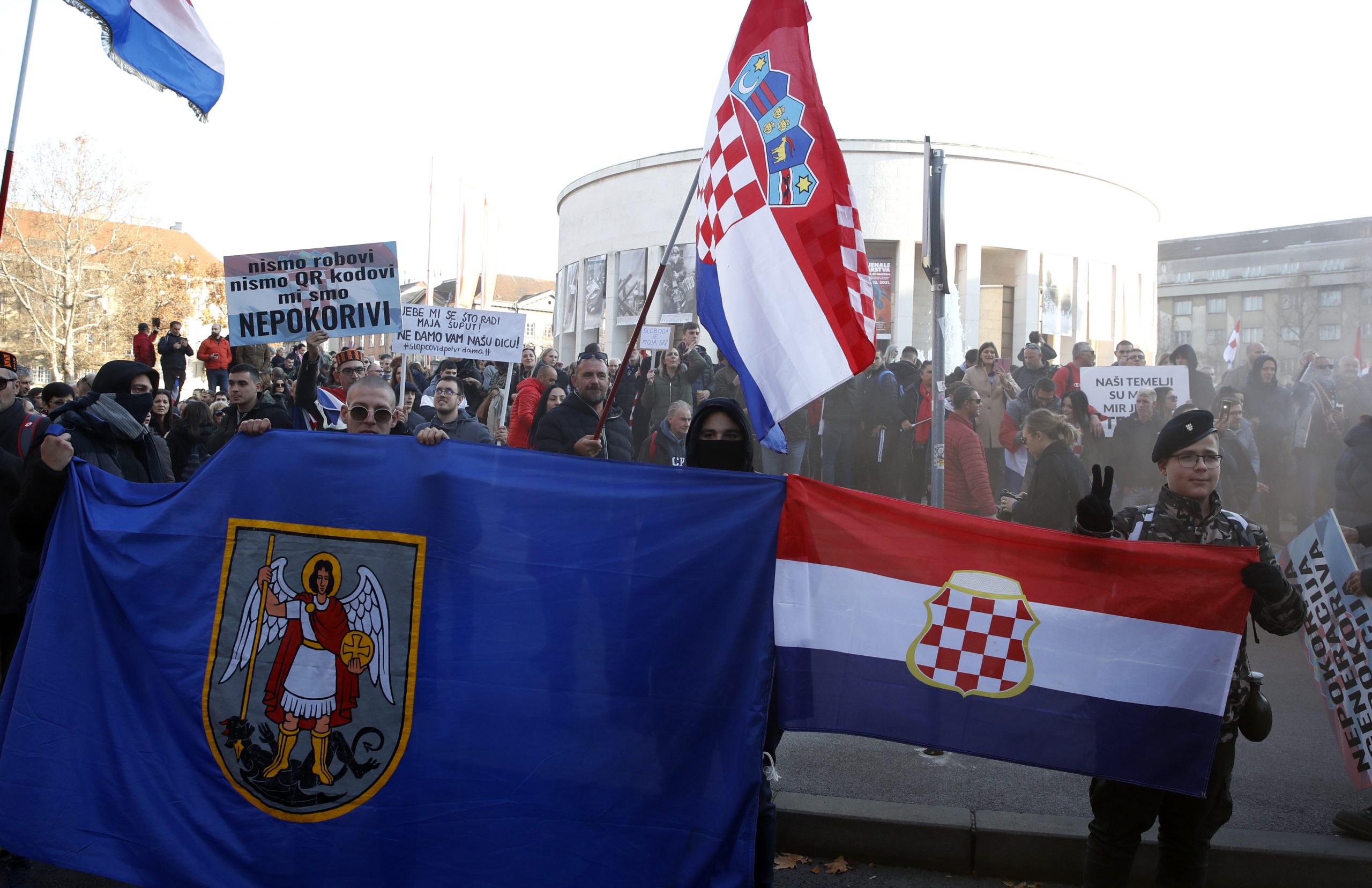 epa09594004 People protest against the Croatian government´s Covid-19 security measures, and against the EU Digital COVID Certificate in downtown Zagreb, Croatia, 20 November 2021. Some 2,000 people gathered for the protest.  EPA-EFE/ANTONIO BAT