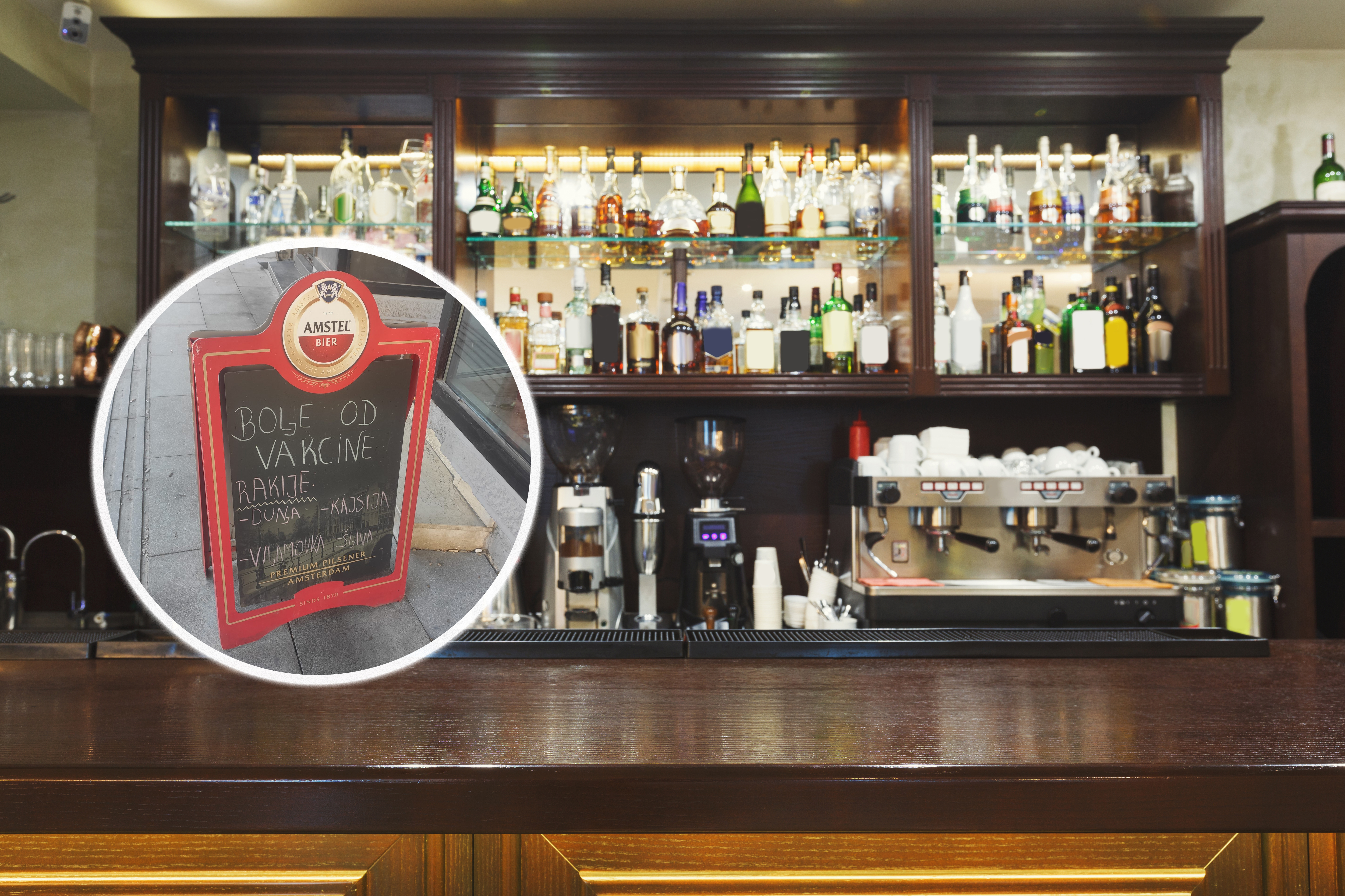 Bar counter with alcohol bottles assortment. Barroom in restaurant, hotel, pub copy space. Cafe background