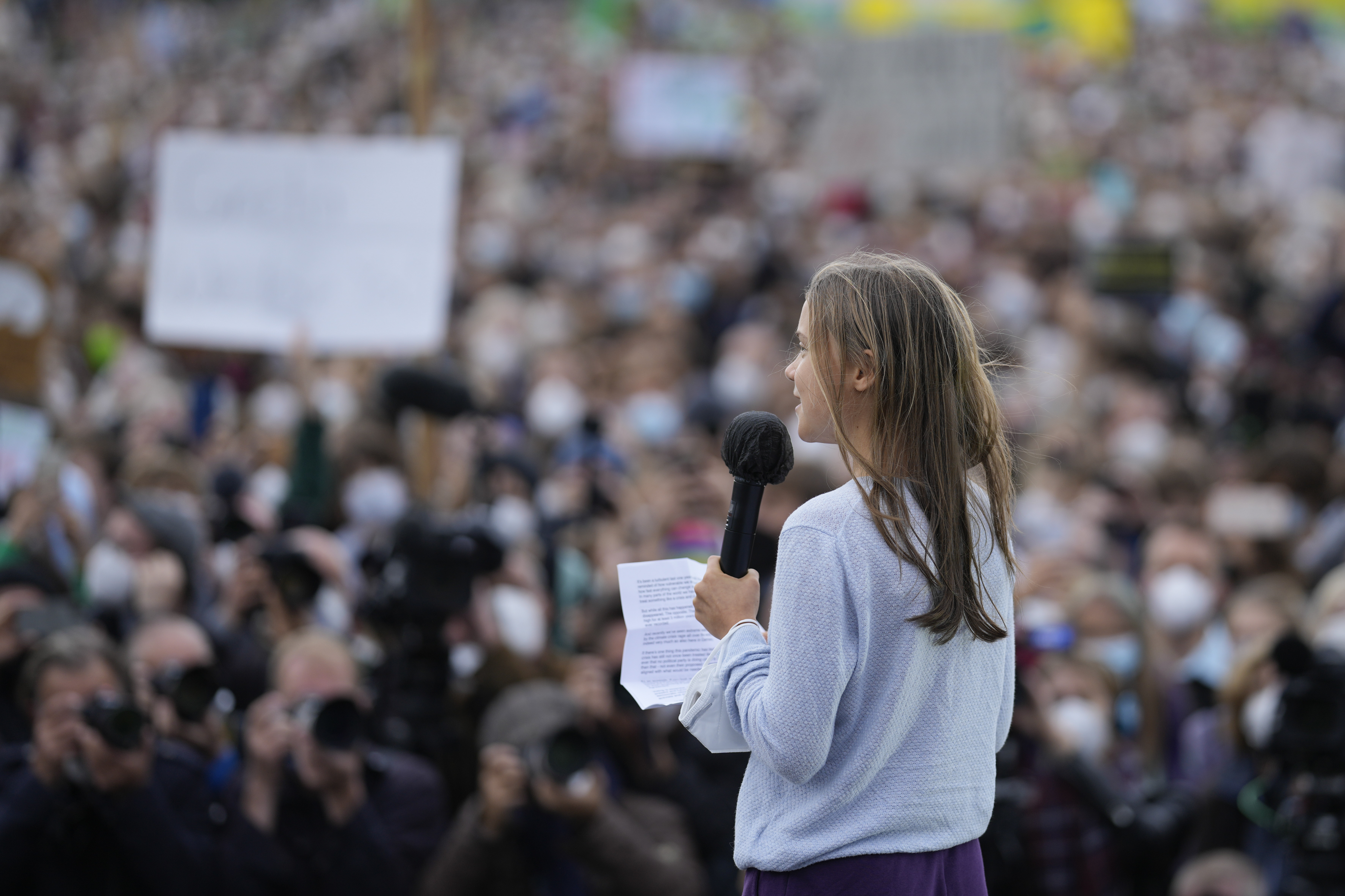 Swedish climate activist Greta Thunberg at a stage during a Fridays for Future global climate strike in Berlin, Germany, Friday, Sept. 24, 2021. (AP Photo/Markus Schreiber)