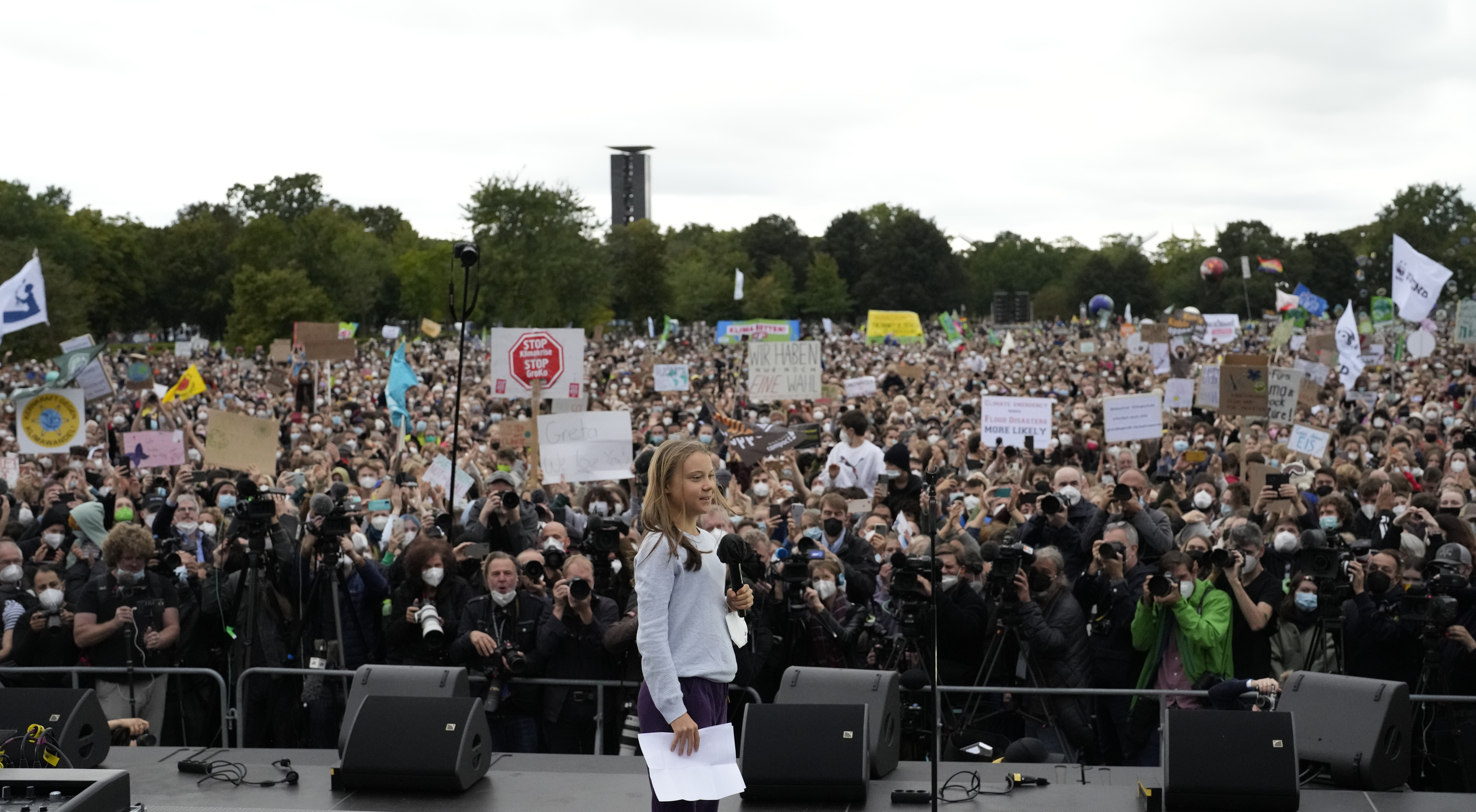 Swedish climate activist Greta Thunberg at a stage during a Fridays for Future global climate strike in Berlin, Germany, Friday, Sept. 24, 2021. (AP Photo/Markus Schreiber)