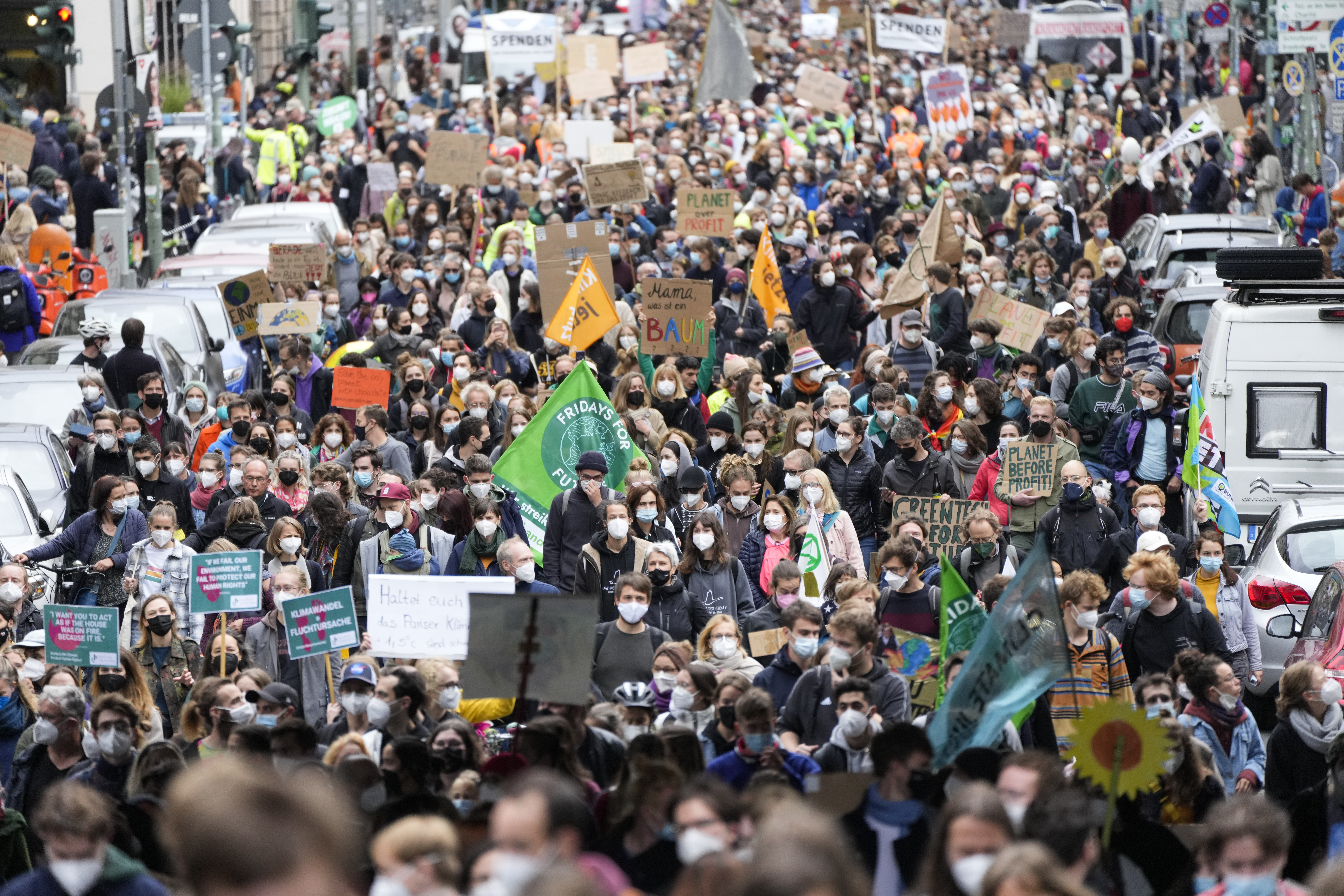 People attend a demonstration as part of a Fridays for Future global climate strike in Berlin, Germany, Friday, Sept. 24, 2021. (AP Photo/Markus Schreiber)