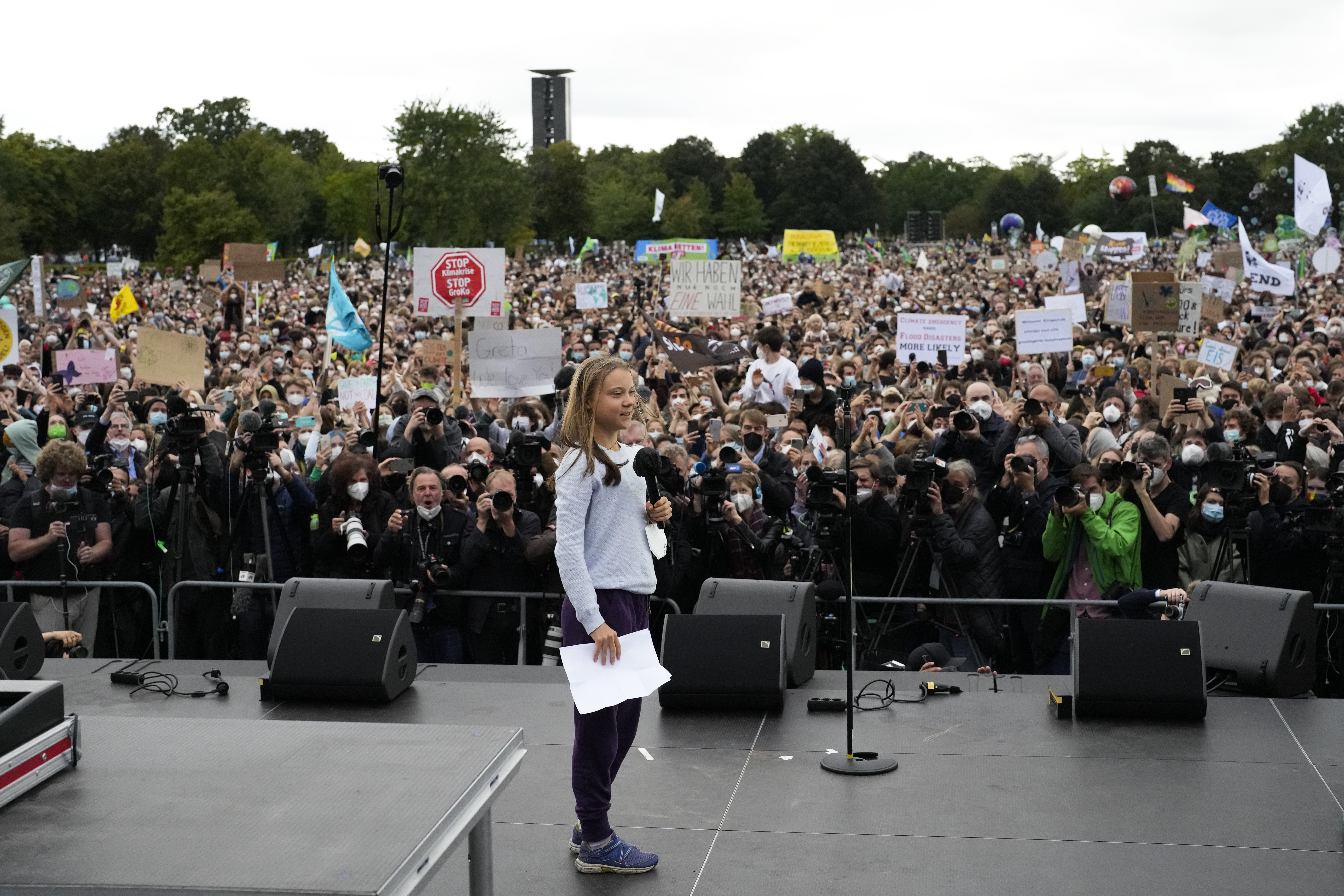 Swedish climate activist Greta Thunberg at a stage during a Fridays for Future global climate strike in Berlin, Germany, Friday, Sept. 24, 2021. (AP Photo/Markus Schreiber)