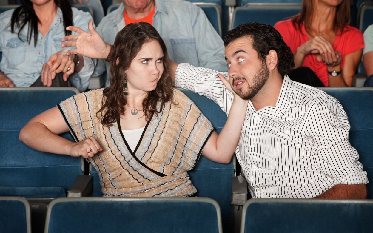 Irked woman gestures to punch man in theater,Image: 152673983, License: Royalty-free, Restrictions: , Model Release: yes, Credit line: YAY Media AS / Alamy / Alamy / Profimedia
